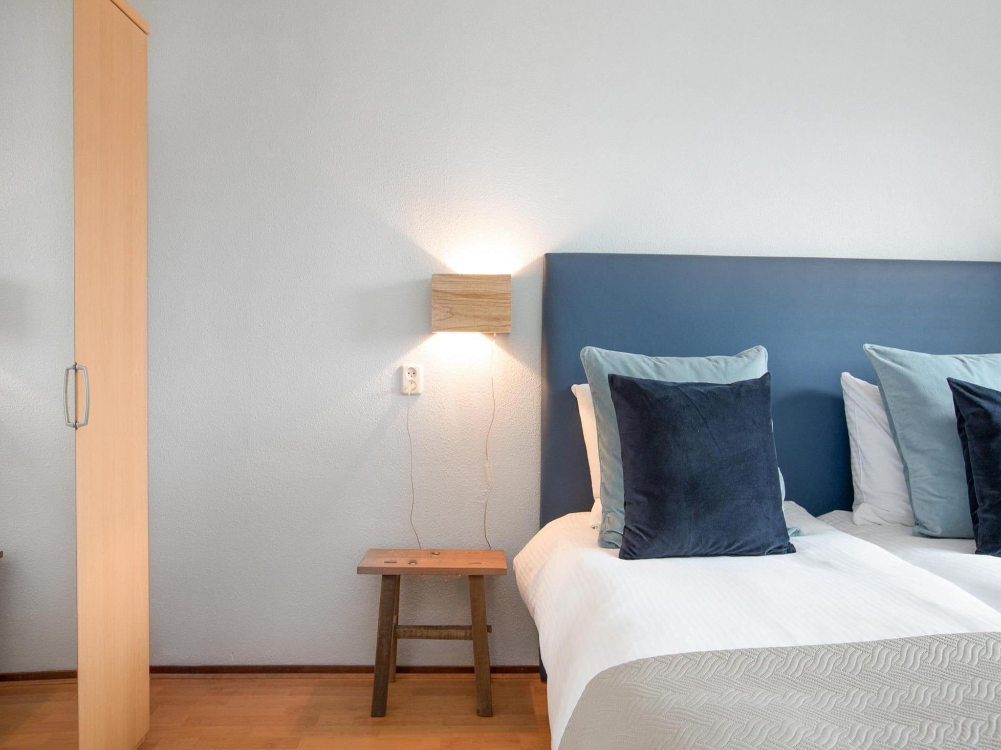 Een slaapkamer van Résidence Juliana 40 in Julianadorp aan Zee