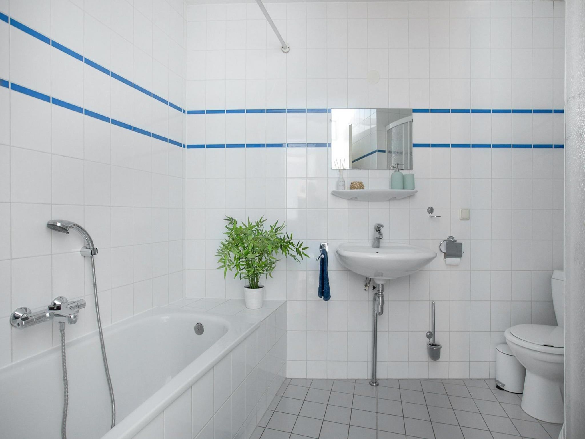 De badkamer van Résidence Juliana 40 in Julianadorp aan Zee