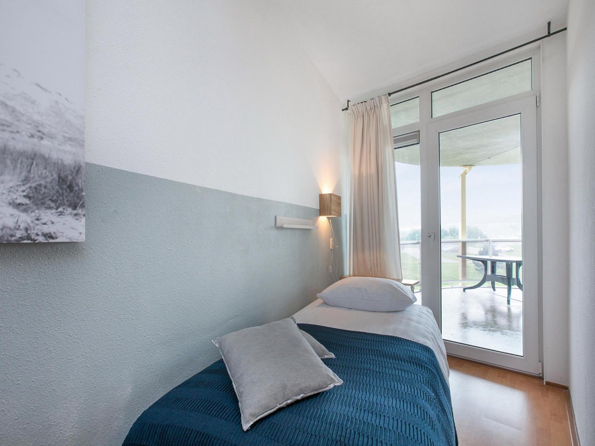 Een slaapkamer van Résidence Juliana 40 in Julianadorp aan Zee