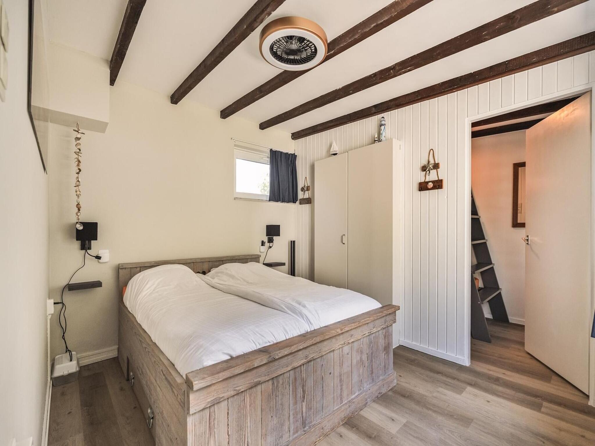 Een slaapkamer van Duinland 197 in Sint Maartenszee