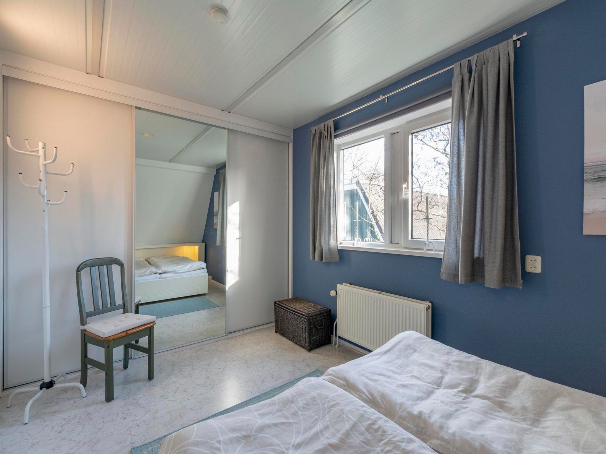 Een slaapkamer van Campanula 39 in Sint Maartenszee