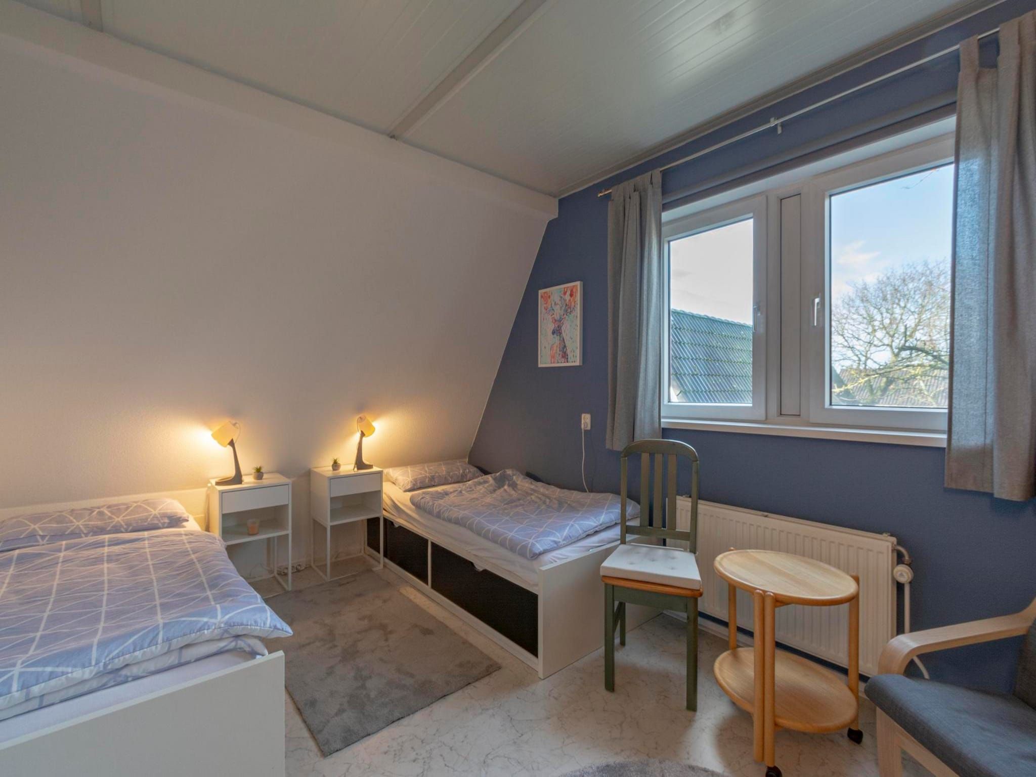 Een slaapkamer van Campanula 39 in Sint Maartenszee