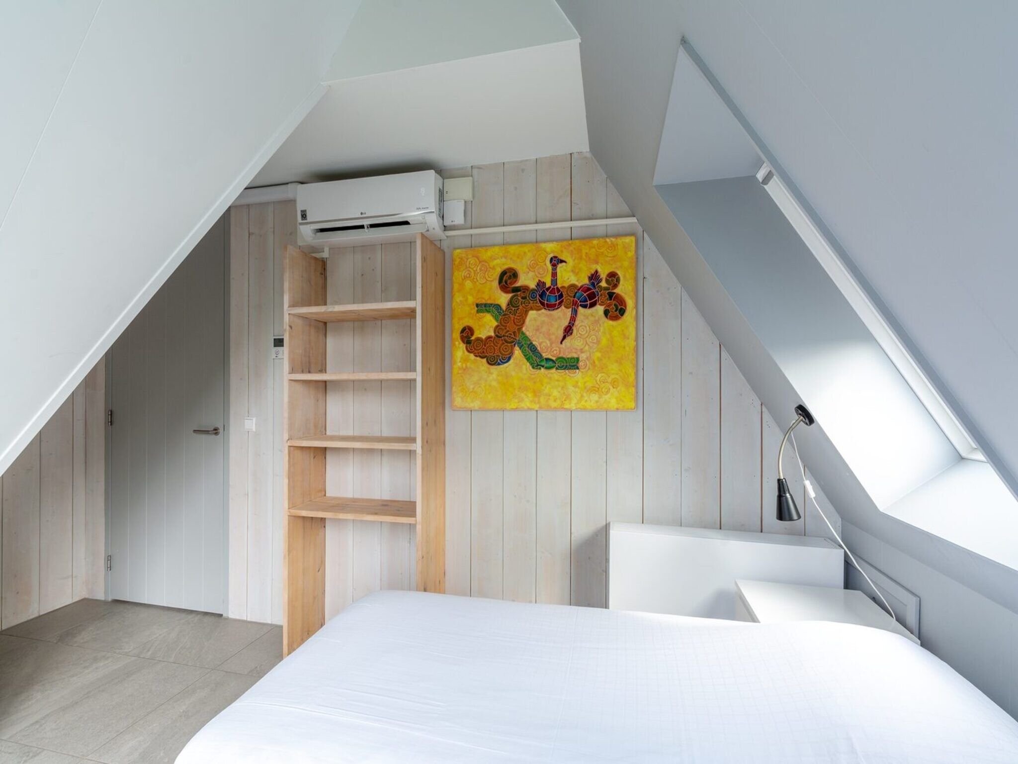 Een slaapkamer van Sandepark 171 in Callantsoog