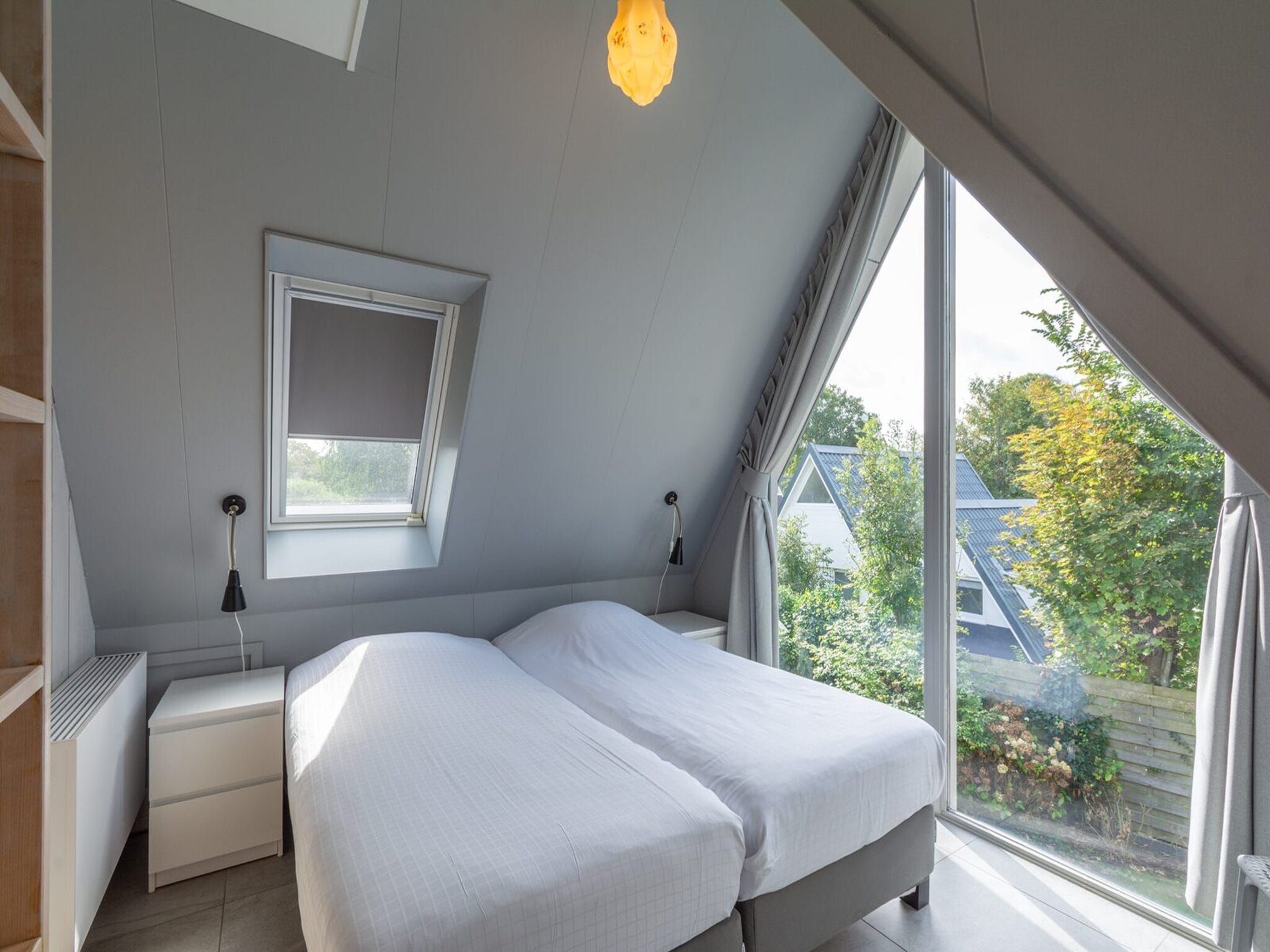 Een slaapkamer van Sandepark 171 in Callantsoog