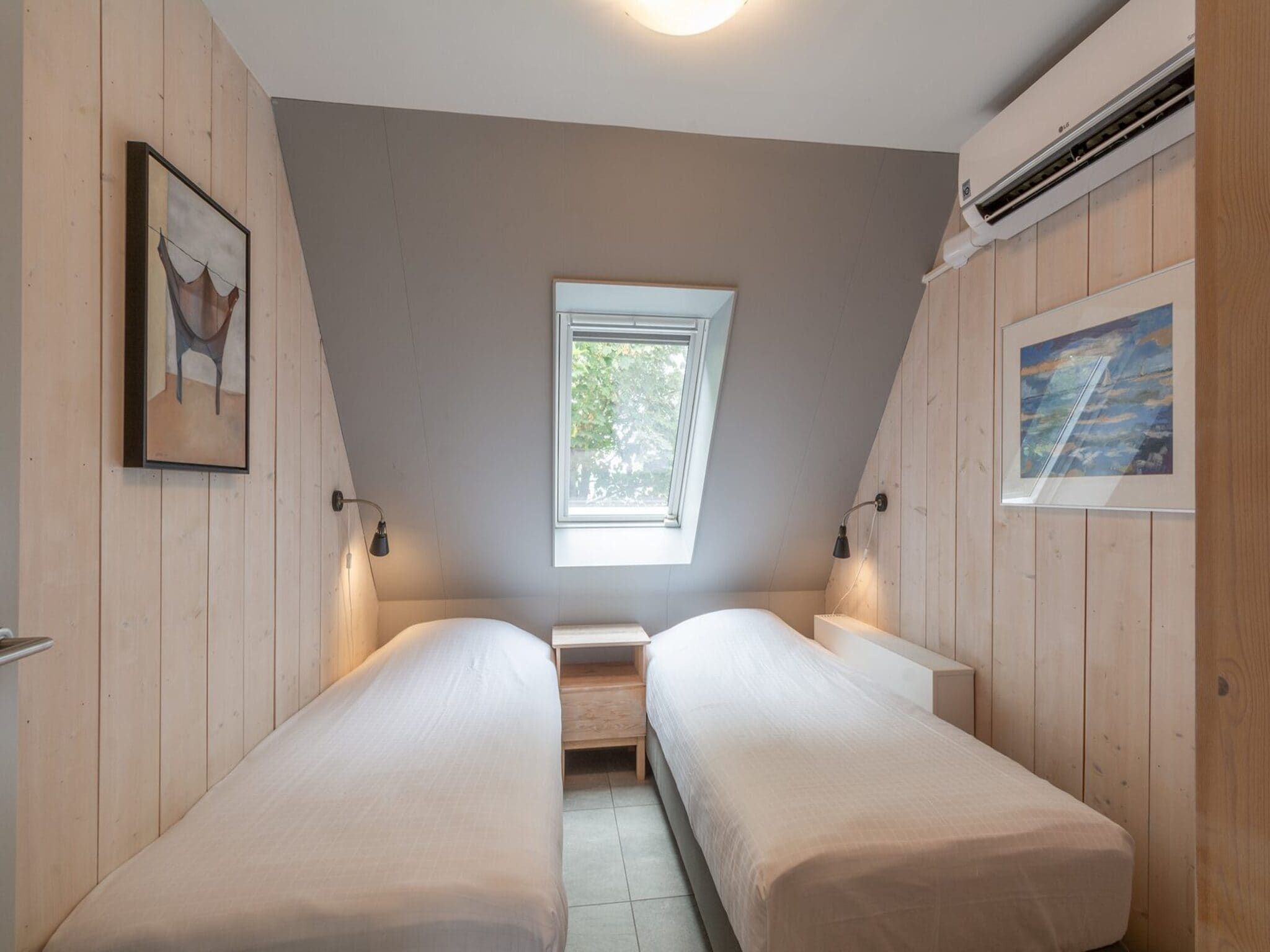 Een slaapkamer van Sandepark 171 in Callantsoog