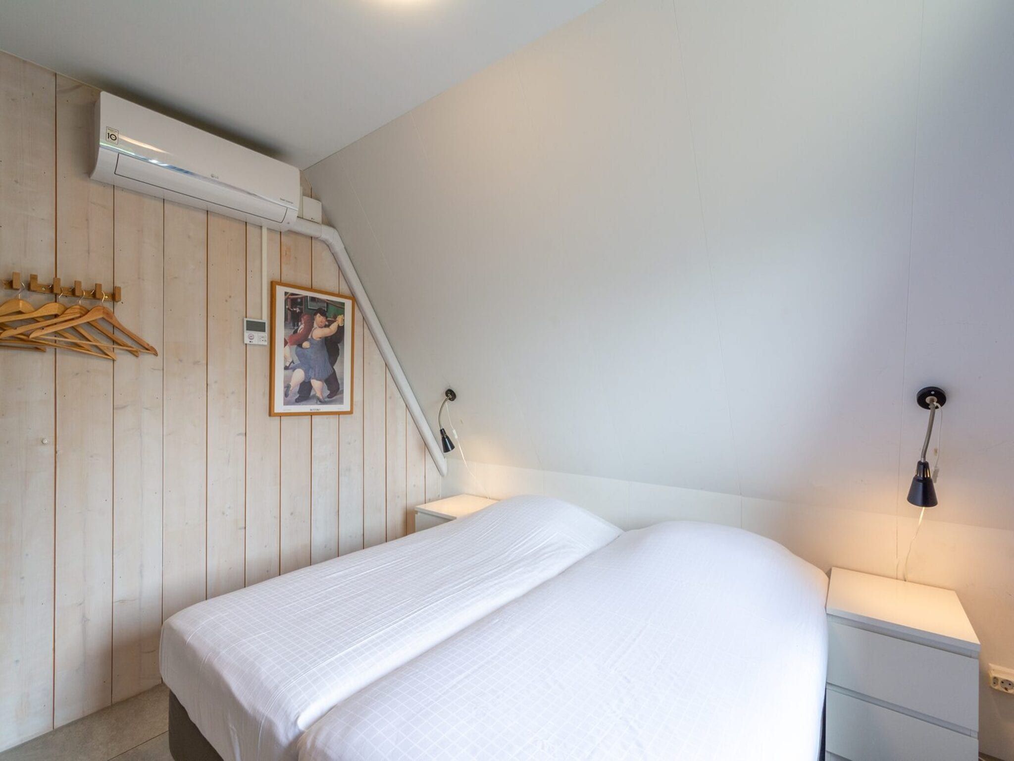 Een slaapkamer van Sandepark 171 in Callantsoog