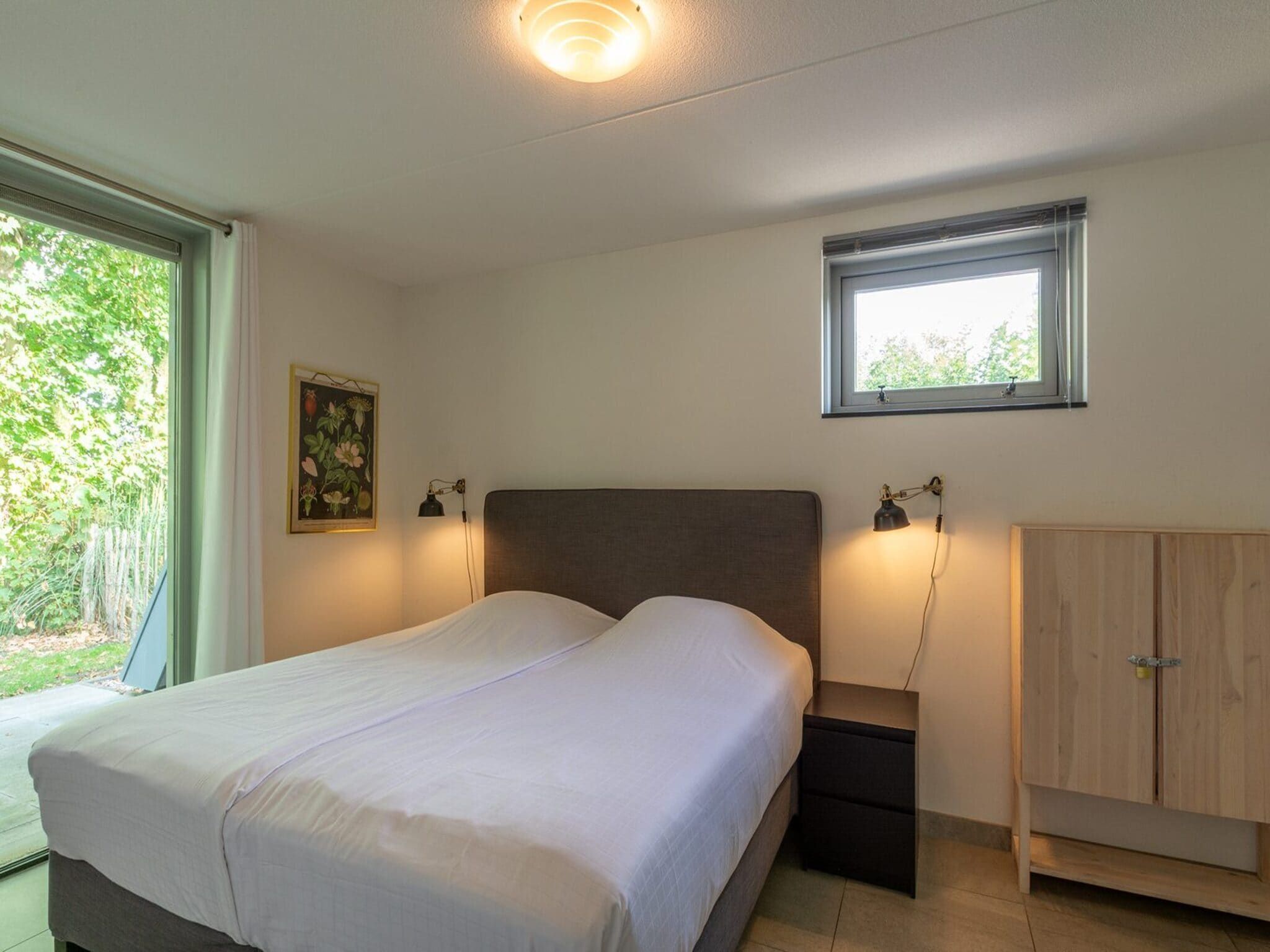Een slaapkamer van Sandepark 171 in Callantsoog