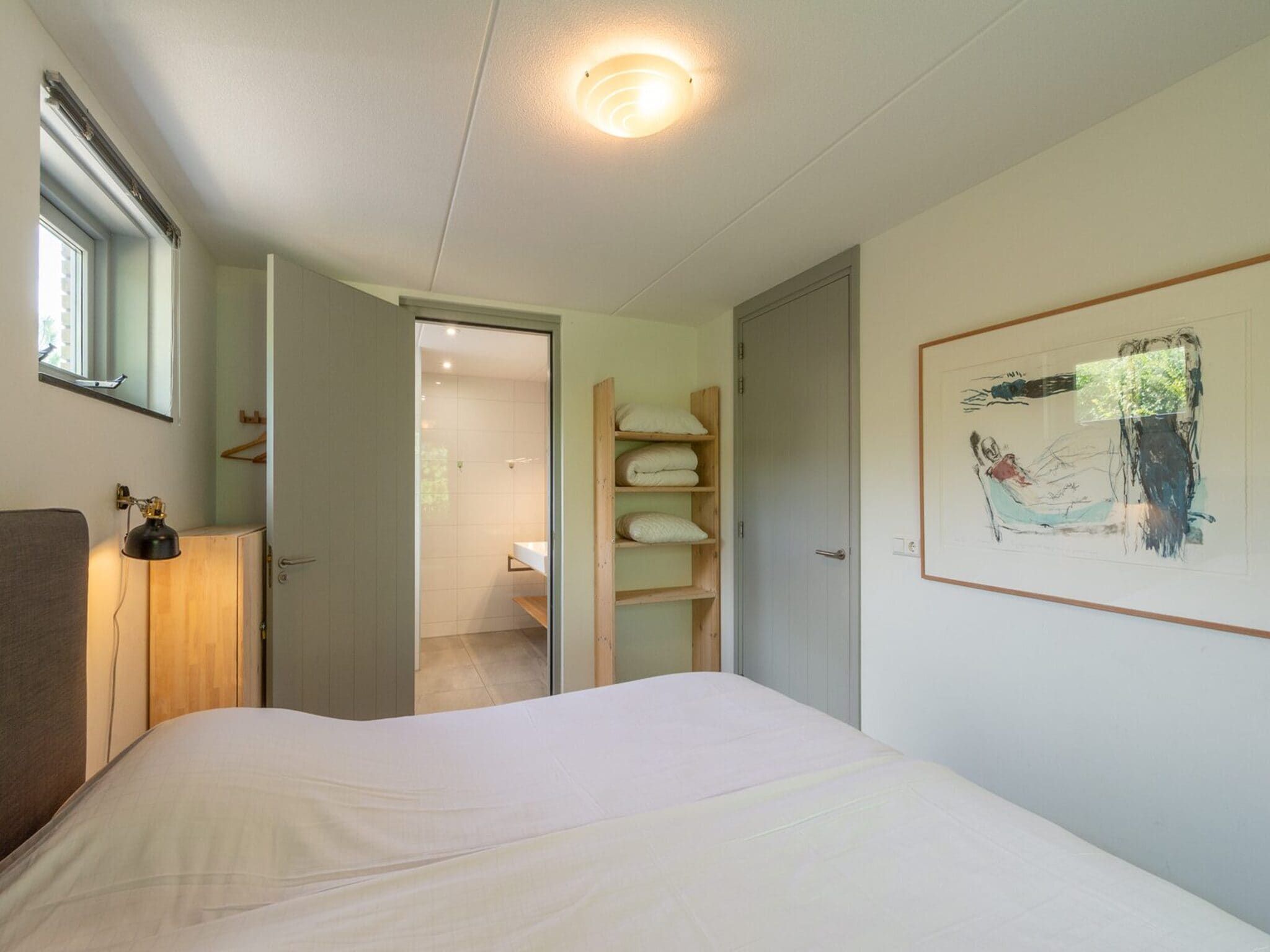 Een slaapkamer van Sandepark 171 in Callantsoog