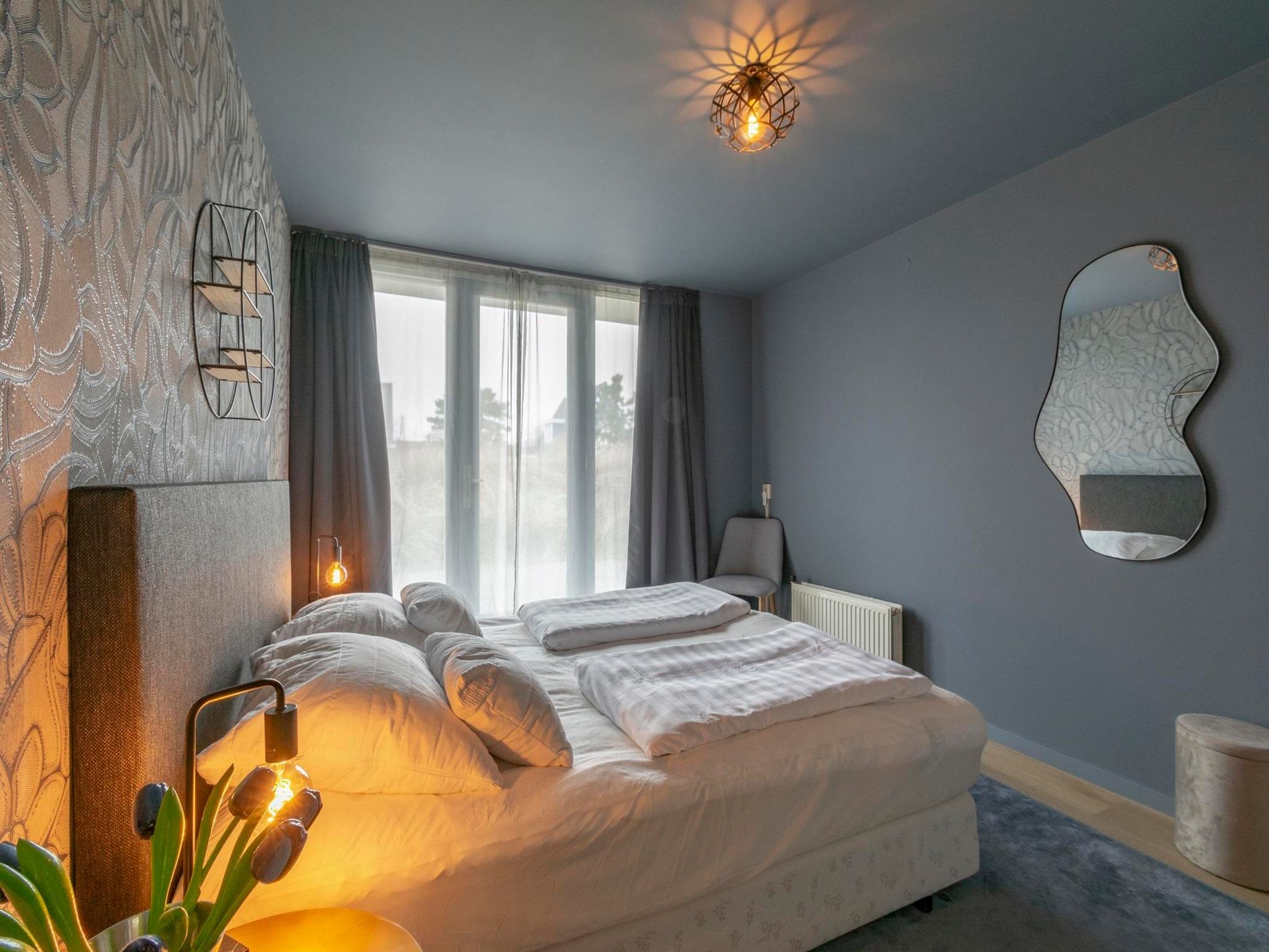Een slaapkamer van Strandleven 006 in Groote Keeten