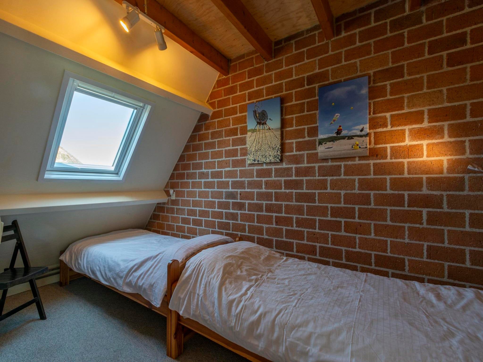 Een slaapkamer van Abbestederweg 24A in Callantsoog