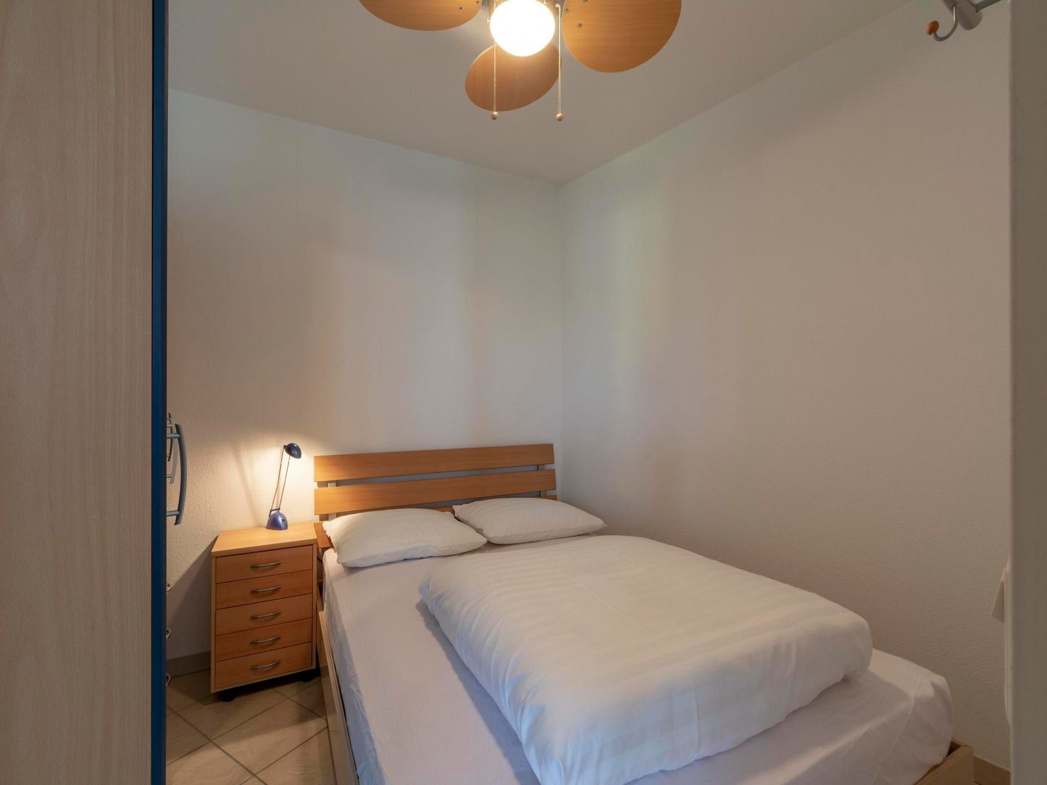 Een slaapkamer van Wijde Blick 208 in Callantsoog