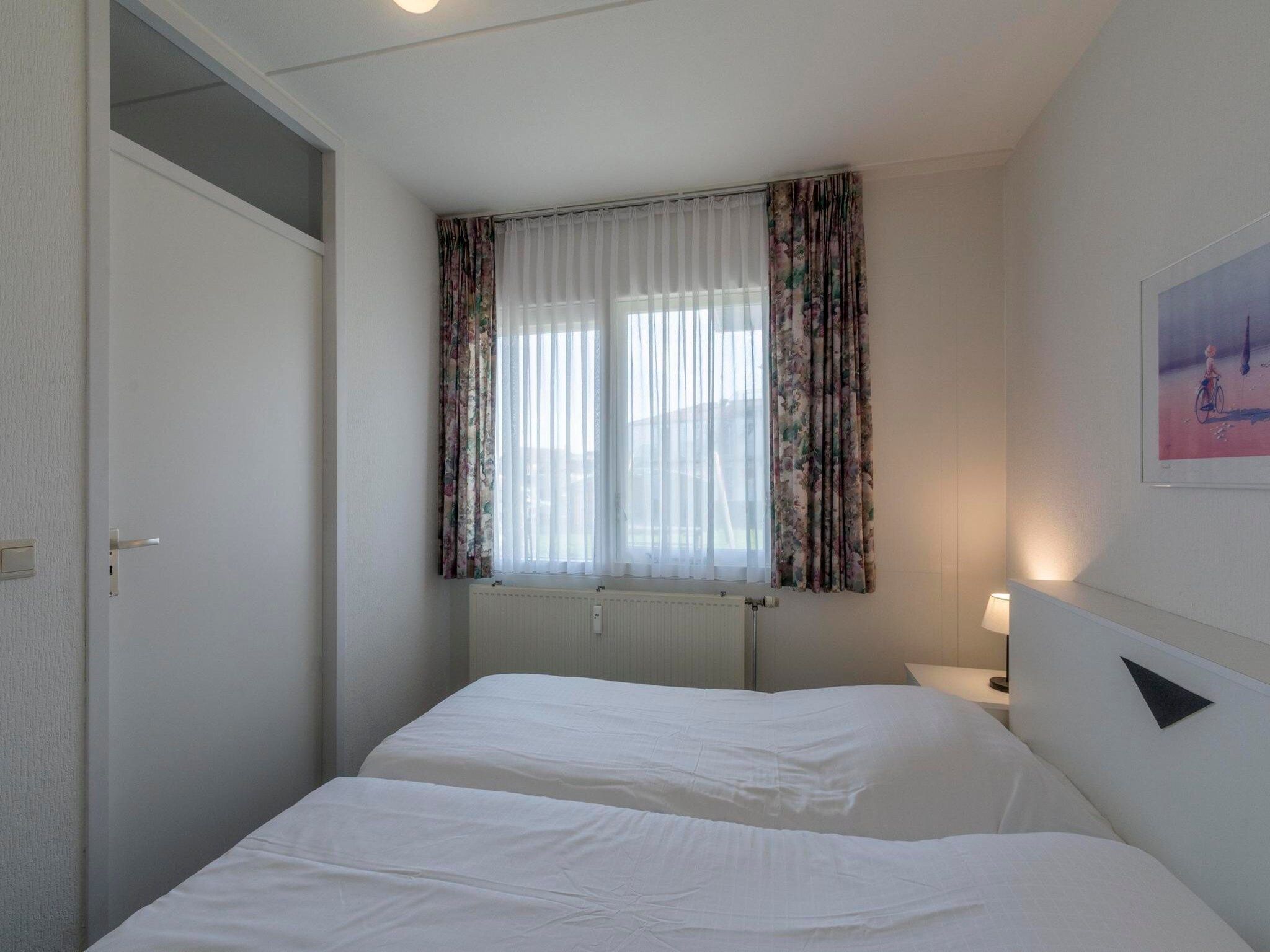 Een slaapkamer van Beach Appartement 05 in Callantsoog
