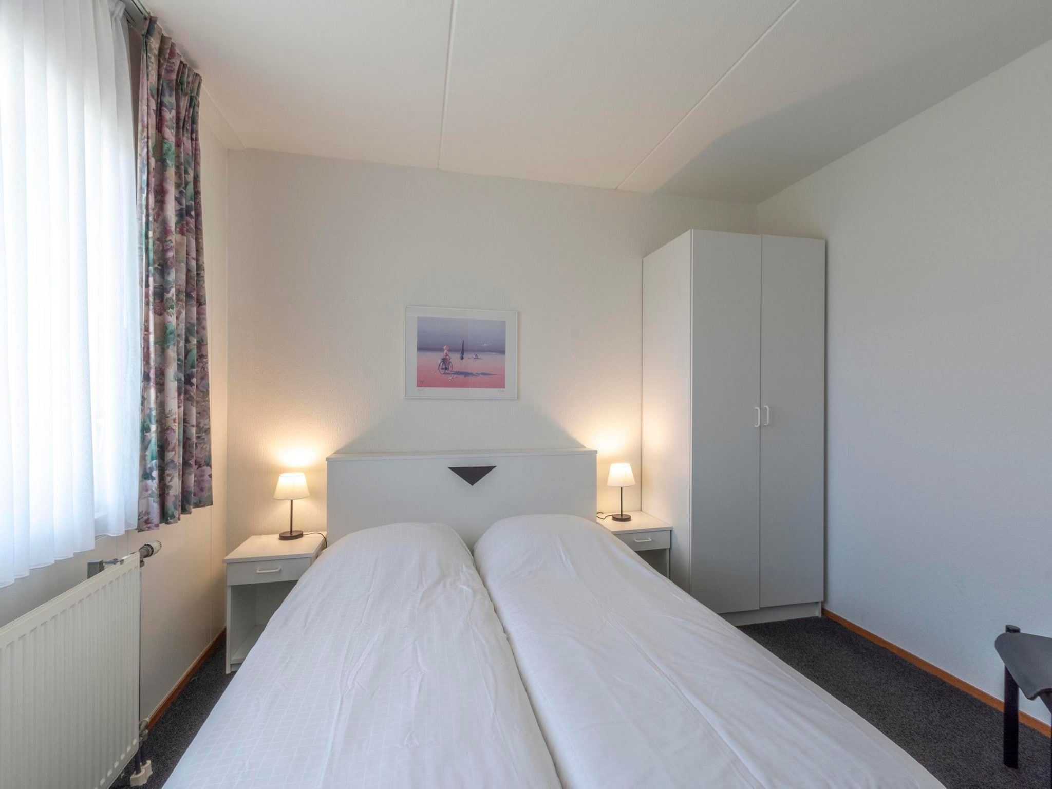 Een slaapkamer van Beach Appartement 05 in Callantsoog