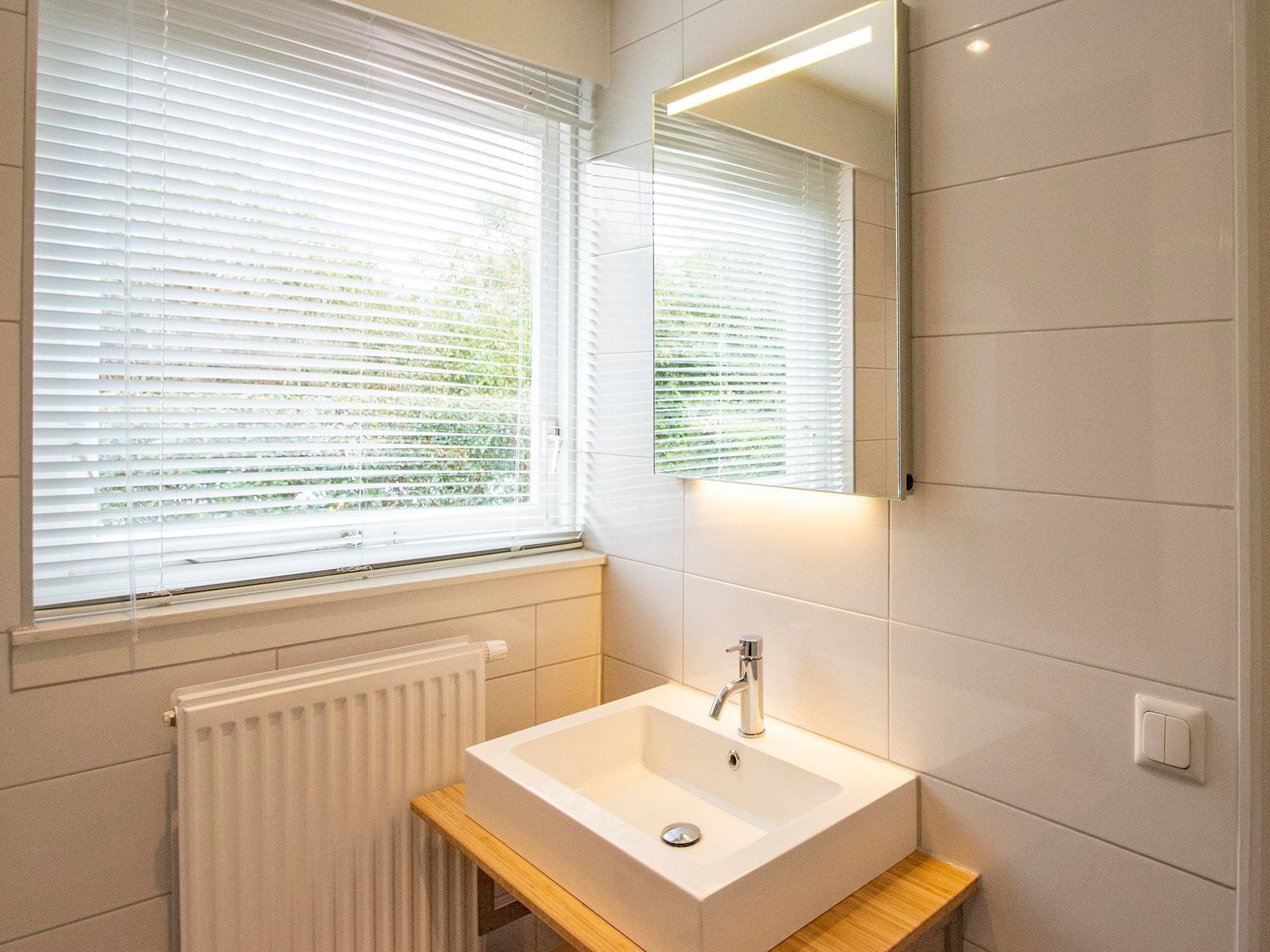 De badkamer van Sandepark 66 in Callantsoog