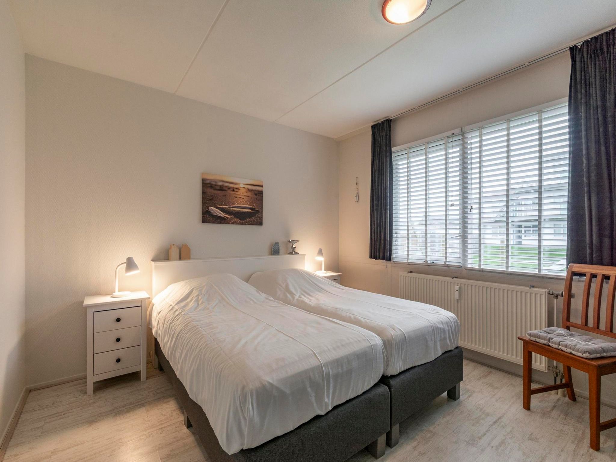 Een slaapkamer van Beach Appartement 07 in Callantsoog