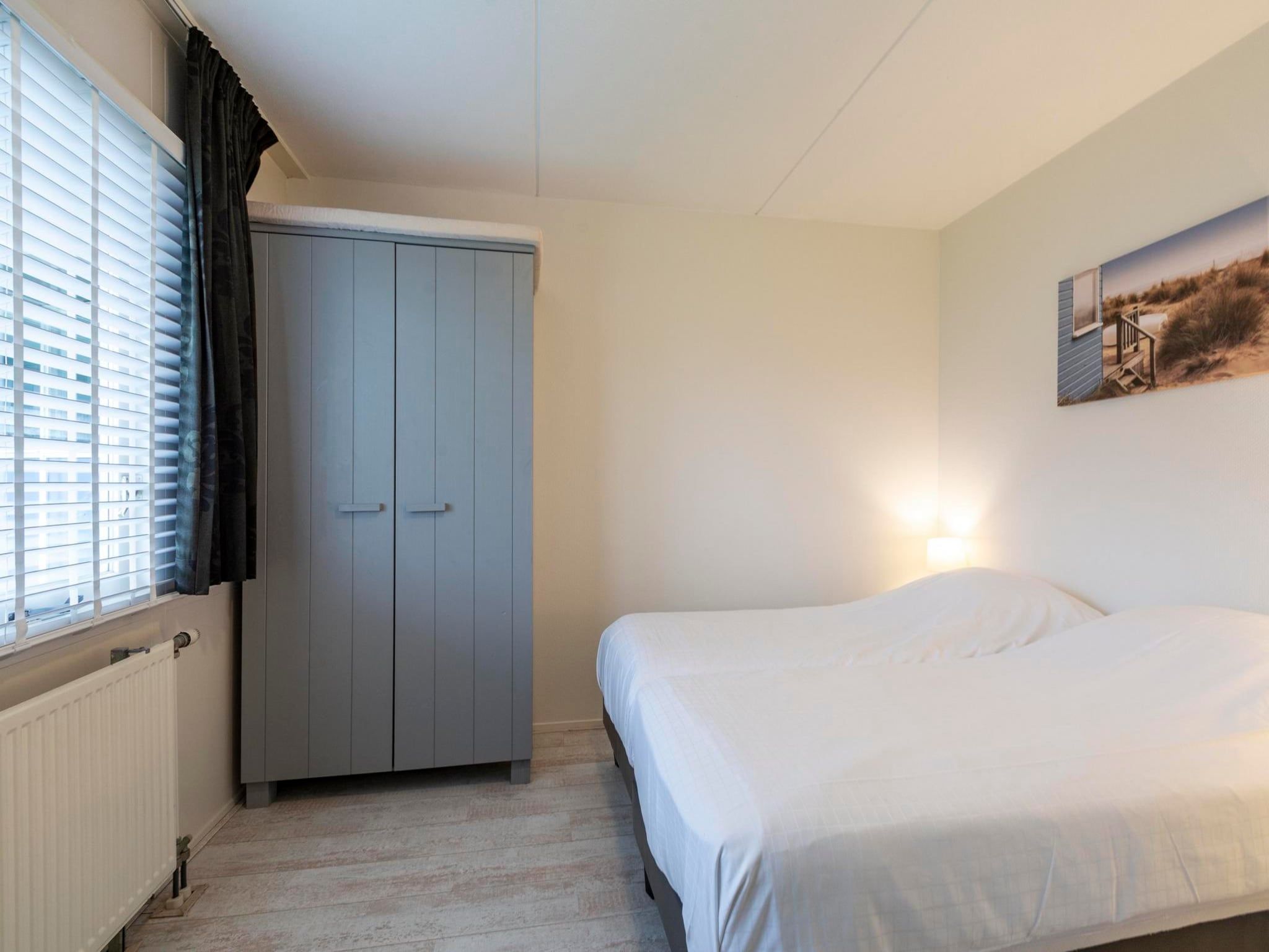 Een slaapkamer van Beach Appartement 07 in Callantsoog