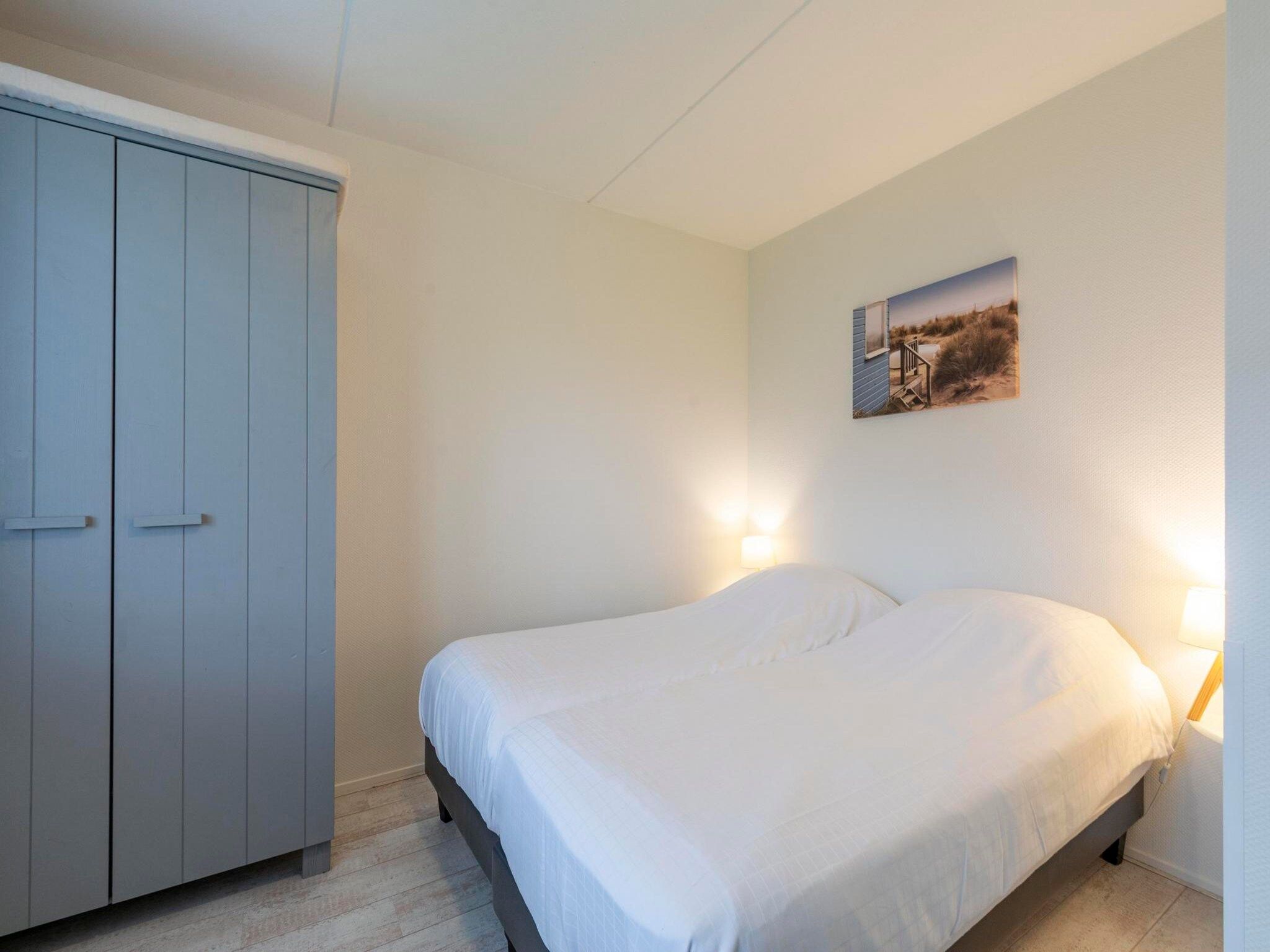 Een slaapkamer van Beach Appartement 07 in Callantsoog