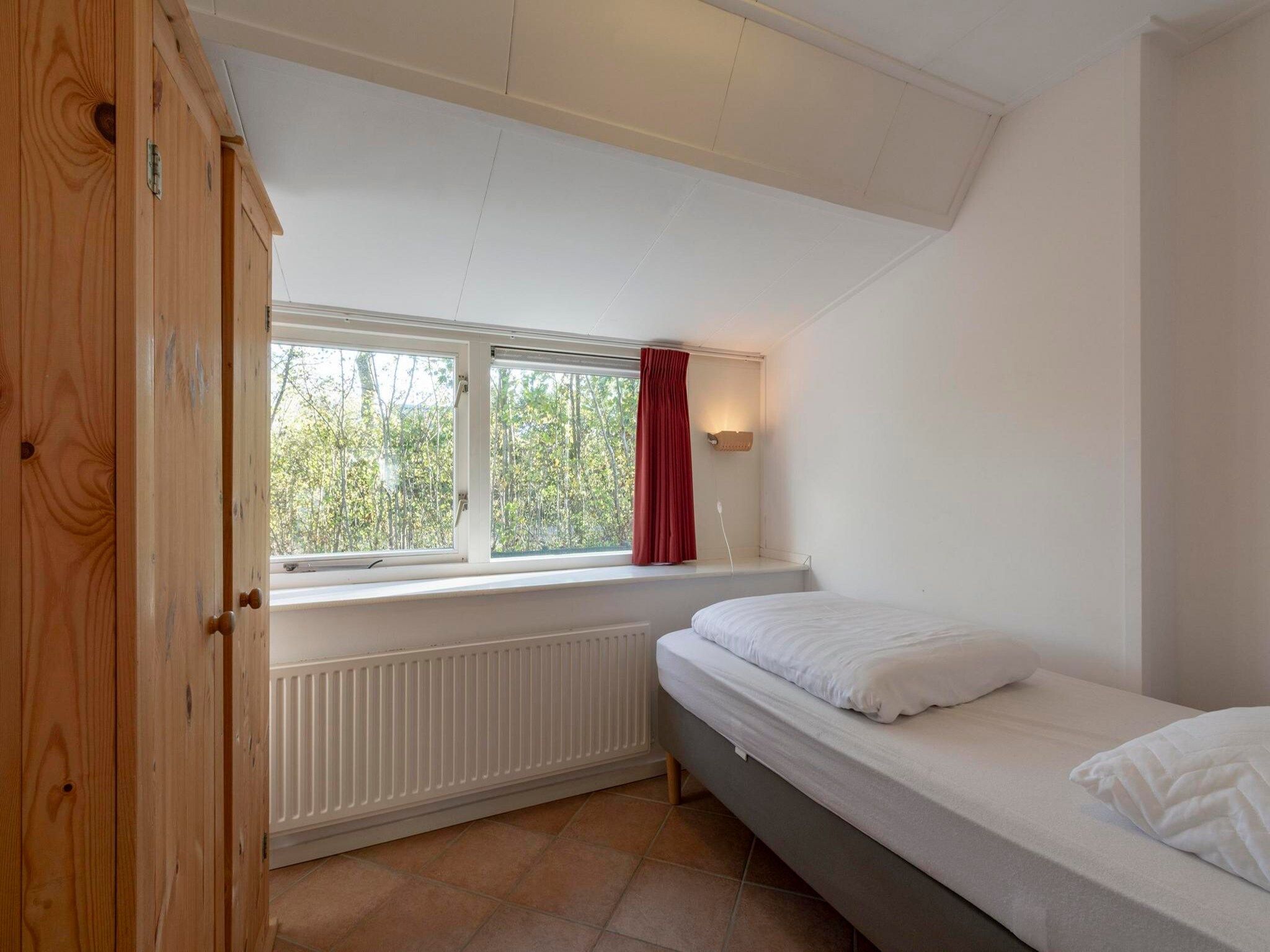 Een slaapkamer van Sandepark 93 in Callantsoog