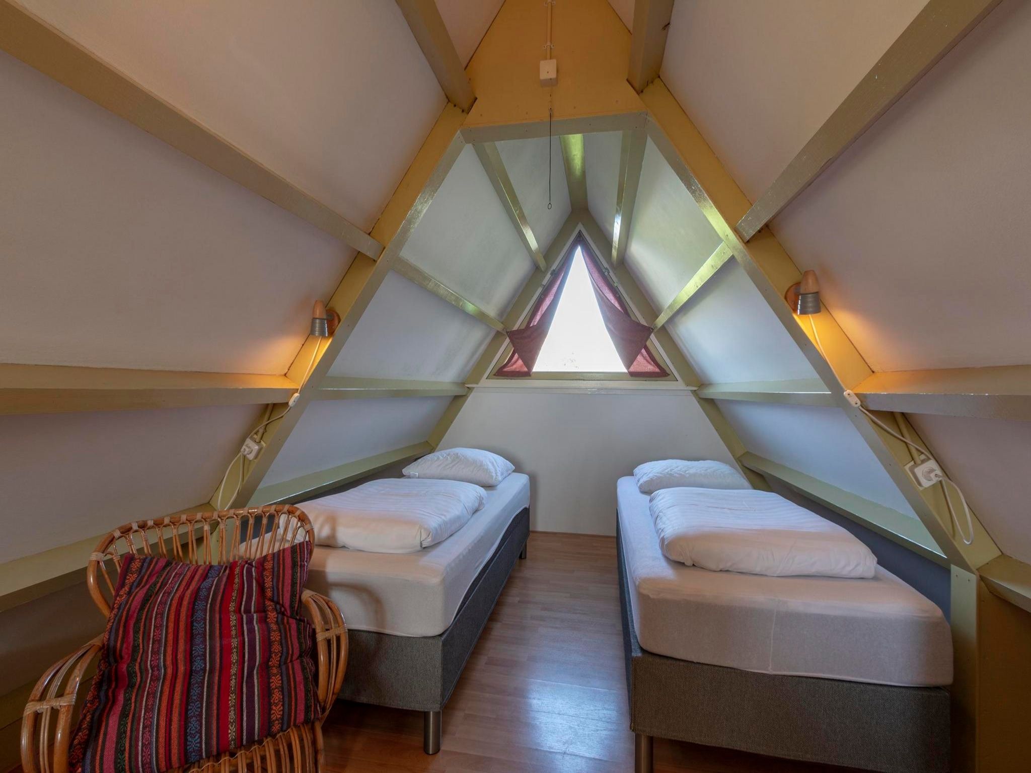 Een slaapkamer van Sandepark 93 in Callantsoog
