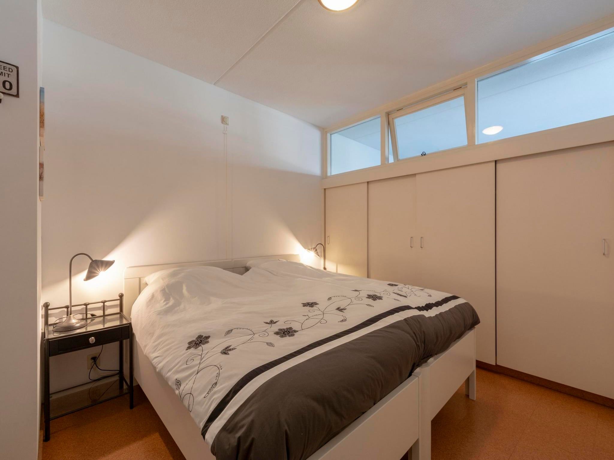 Een slaapkamer van Strandslag 199 in Julianadorp aan Zee