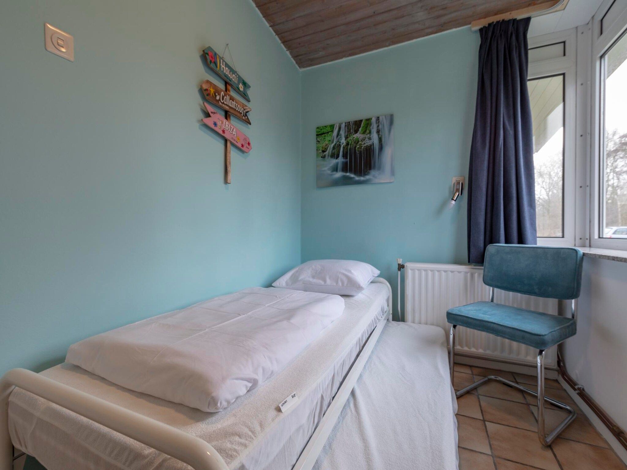 Een slaapkamer van Duinland XL in Sint Maartenszee