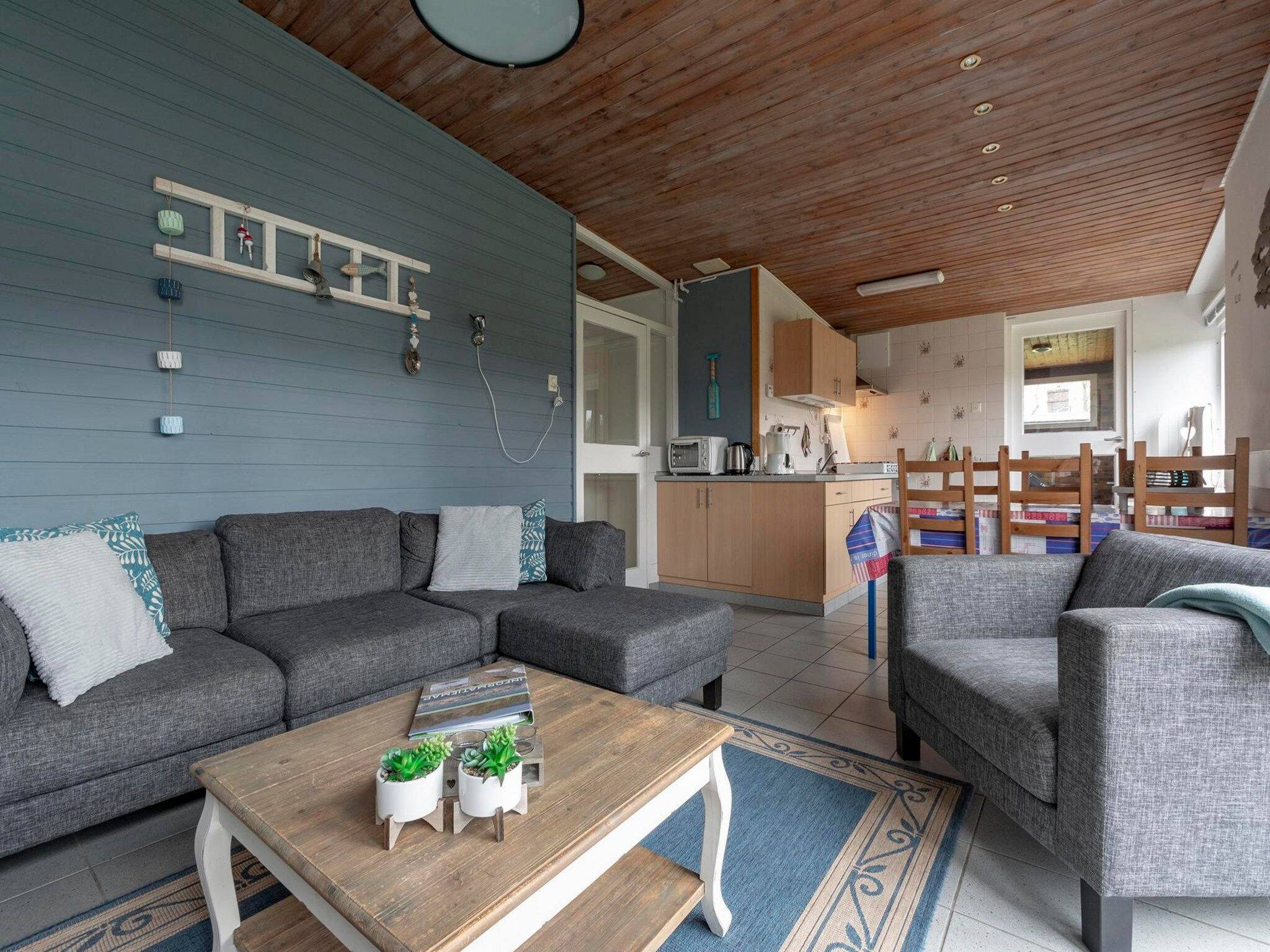 De woonkamer van Duinland XL in Sint Maartenszee