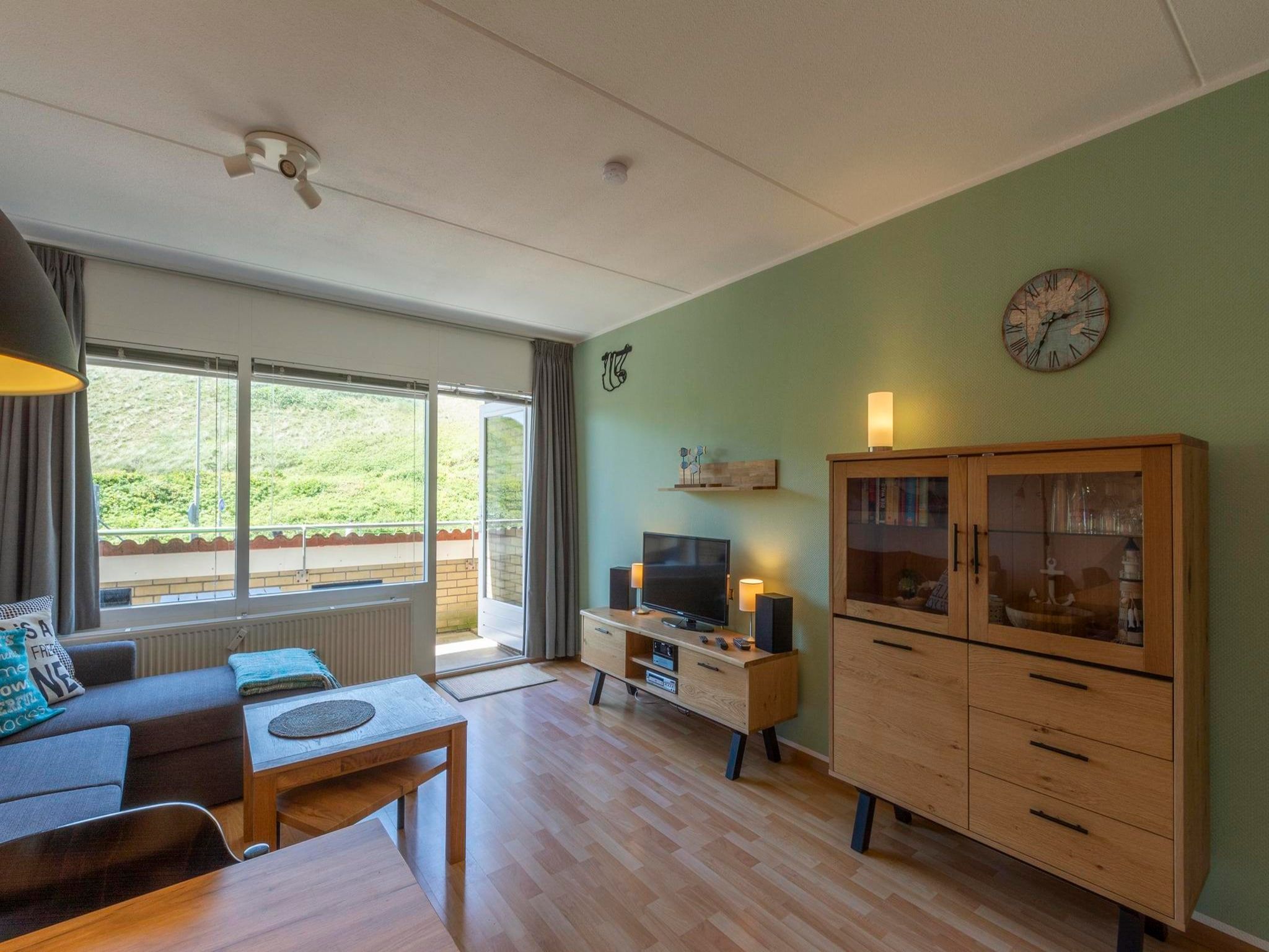 De woonkamer van Beach Appartement 25 in Callantsoog