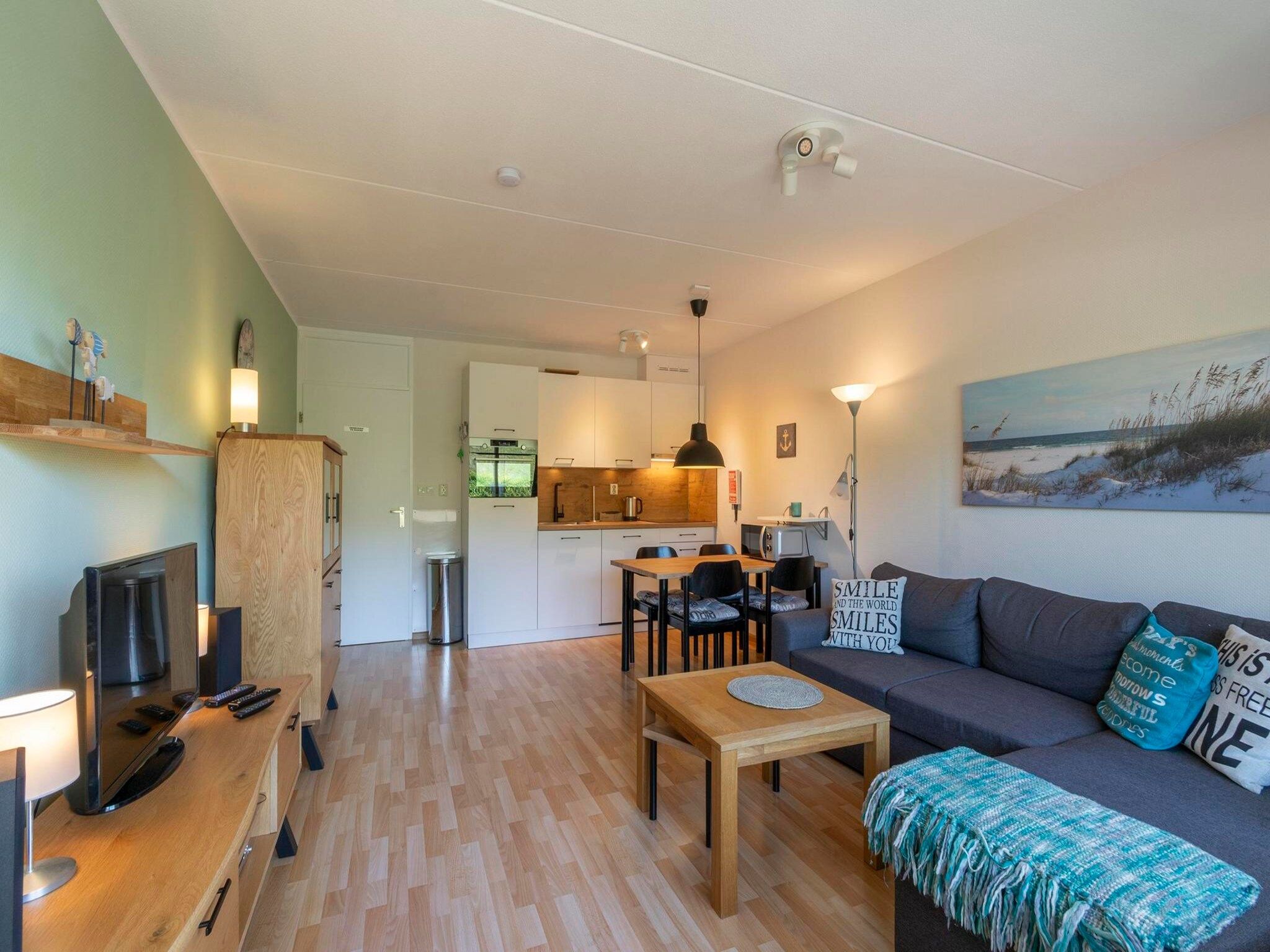 De woonkamer van Beach Appartement 25 in Callantsoog