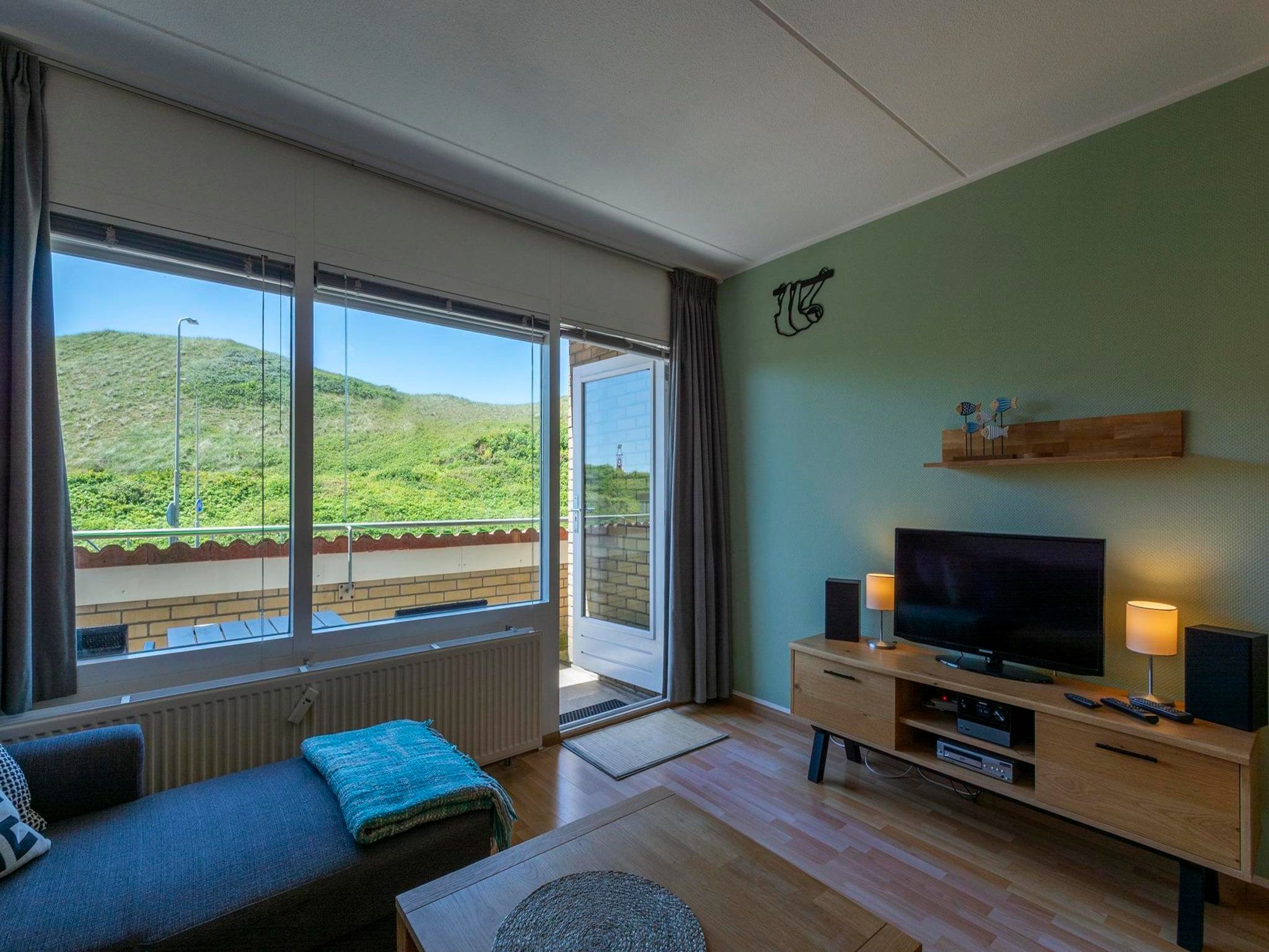 Een slaapkamer van Beach Appartement 25 in Callantsoog