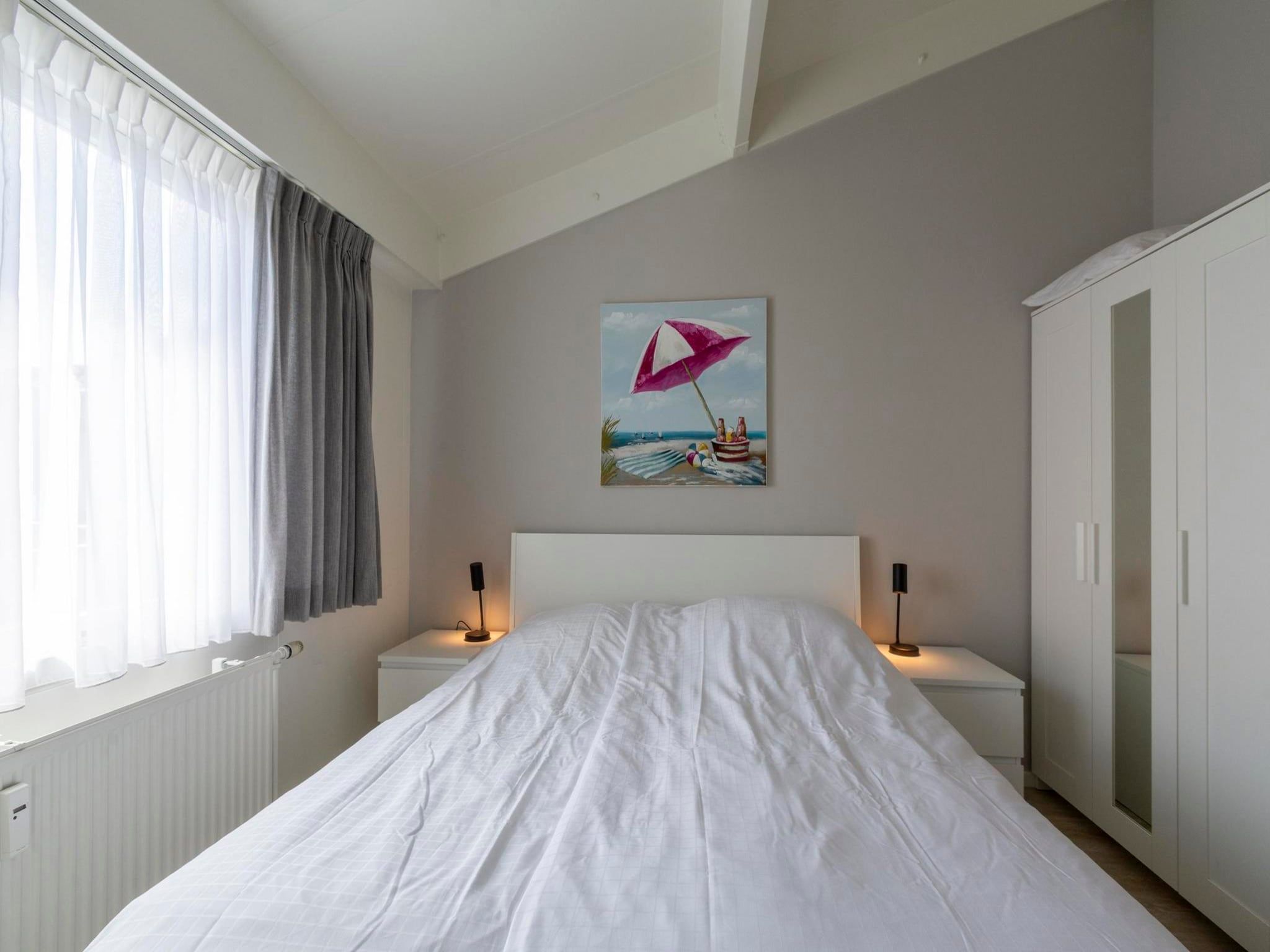 Een slaapkamer van Beach Appartement 35 in Callantsoog