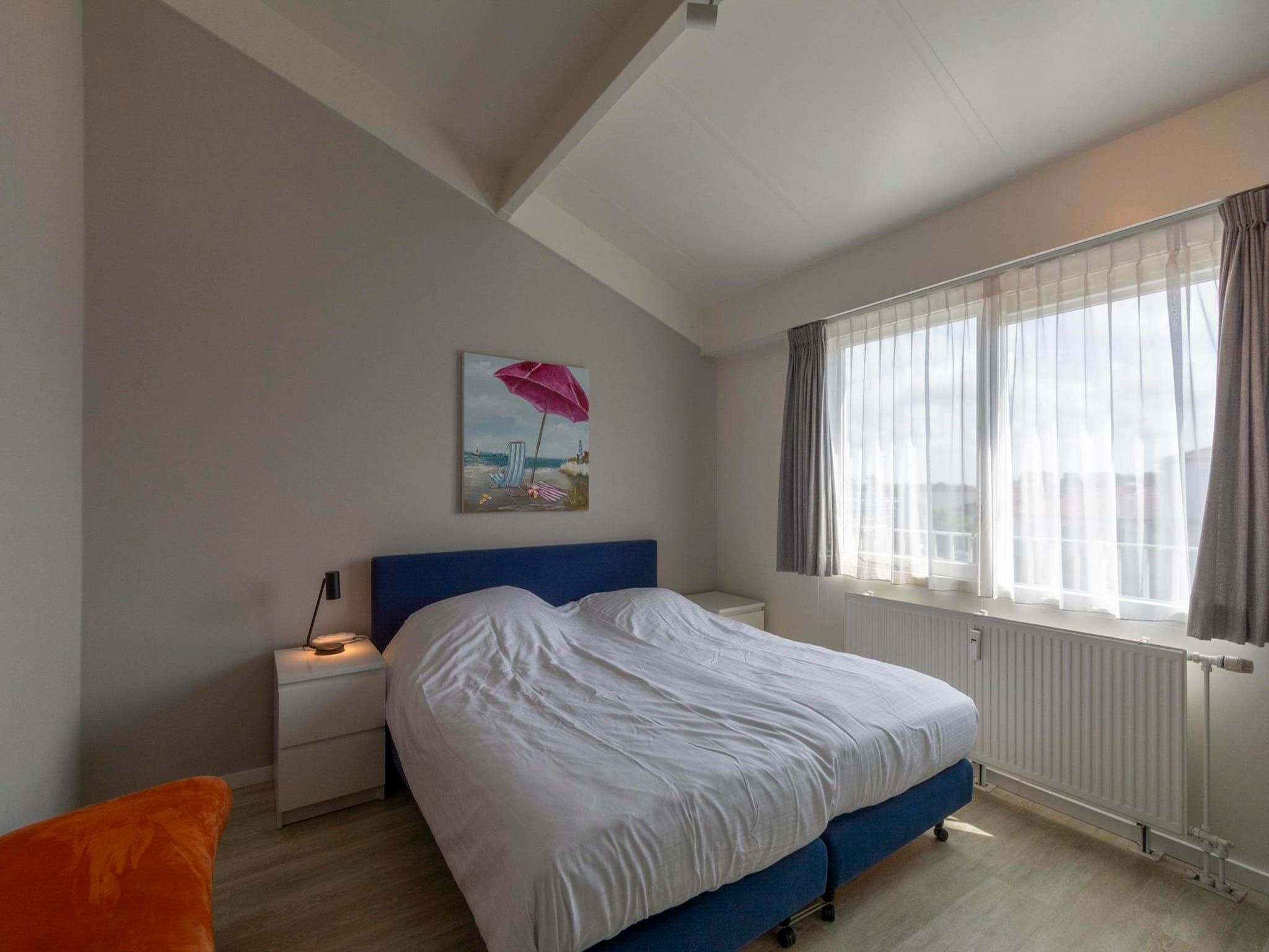 Een slaapkamer van Beach Appartement 35 in Callantsoog
