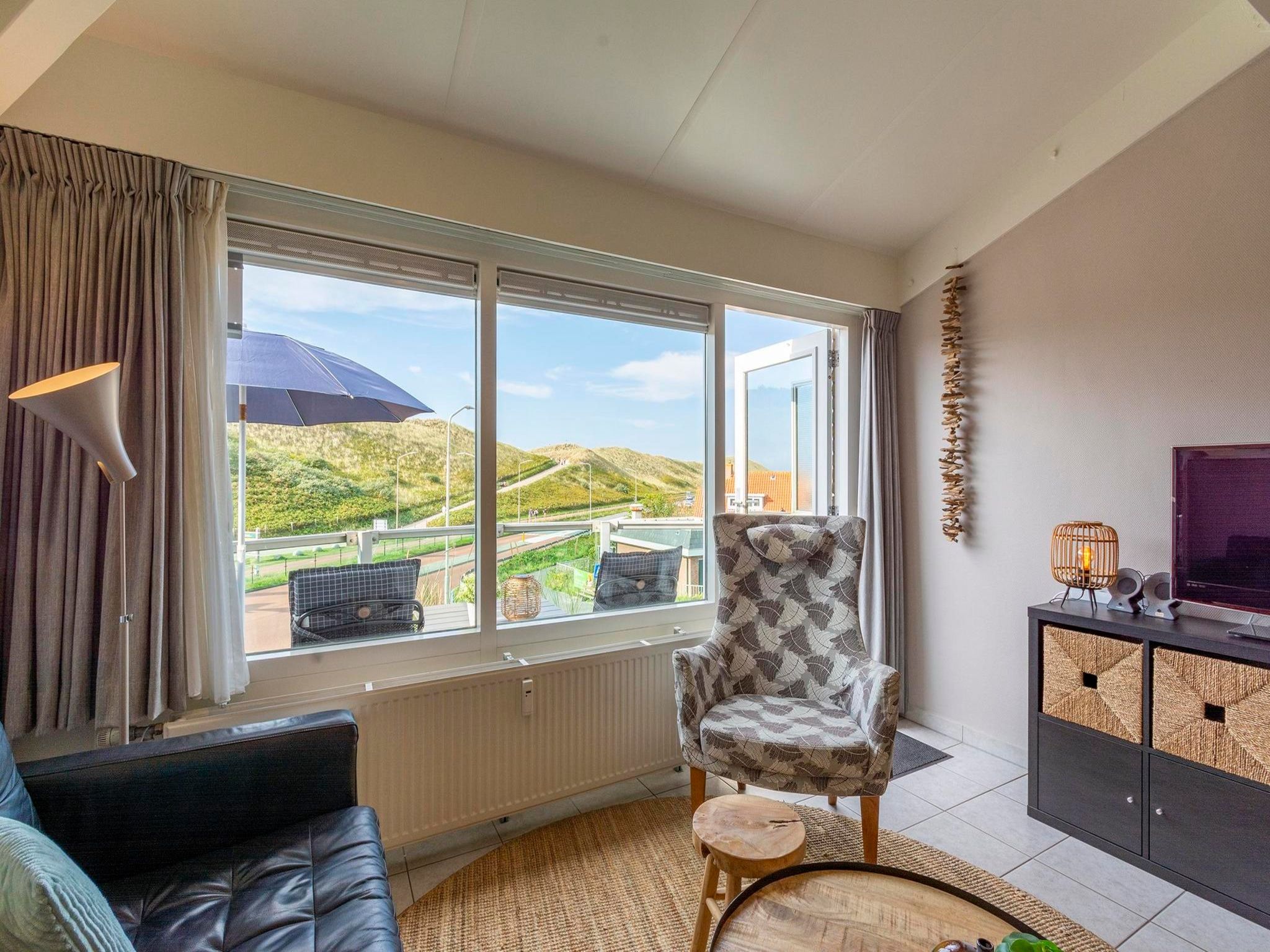 De woonkamer van Beach Appartement 36 in Callantsoog