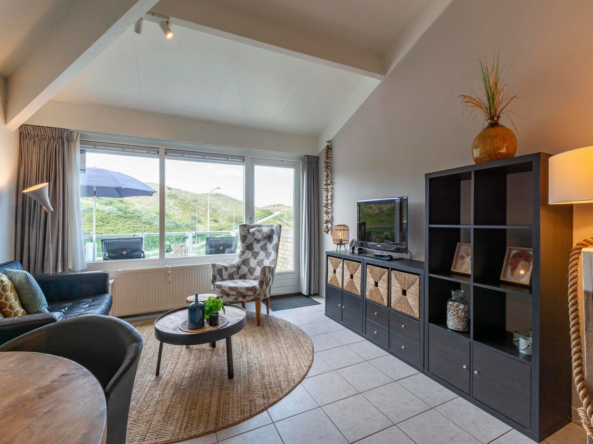 De woonkamer van Beach Appartement 36 in Callantsoog