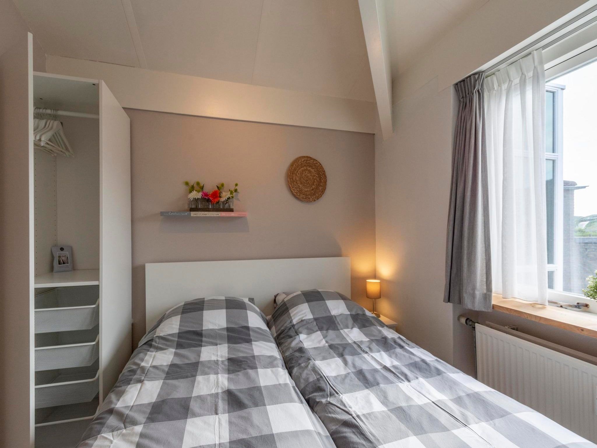 Een slaapkamer van Beach Appartement 36 in Callantsoog