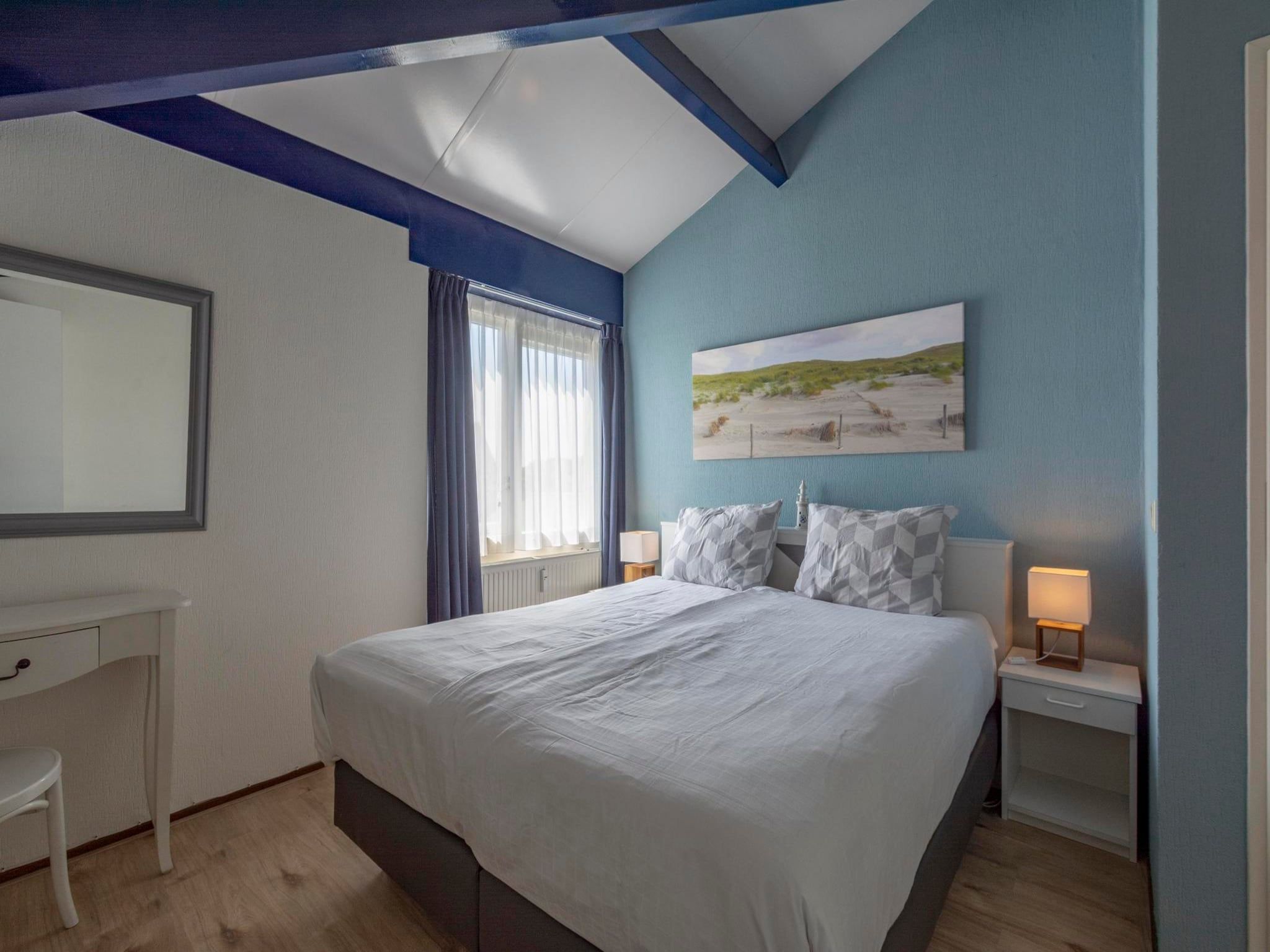 Een slaapkamer van Beach Appartement 41 in Callantsoog