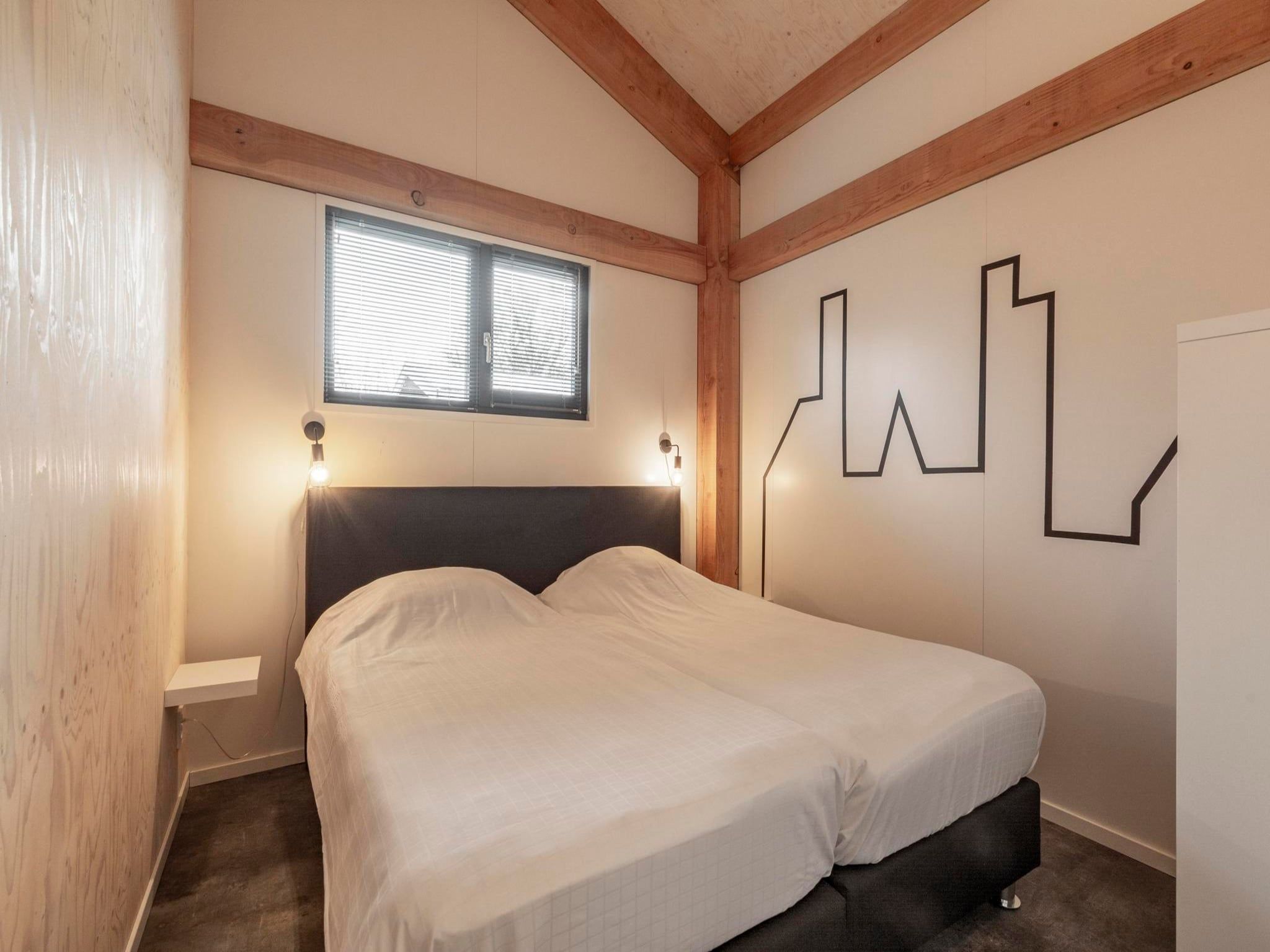 Een slaapkamer van Duinvink in Sint Maartenszee