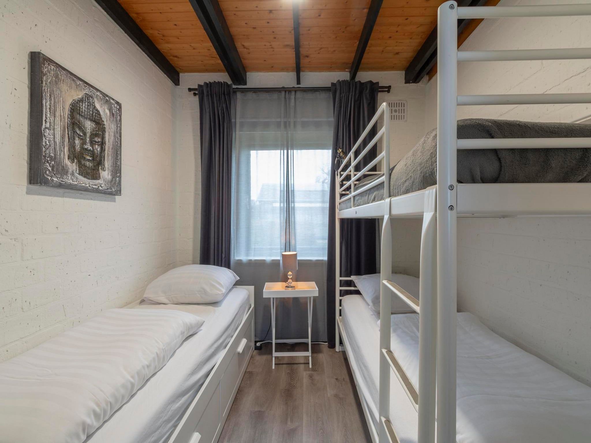 Een slaapkamer van Boerenslag 2 in Sint Maartenszee