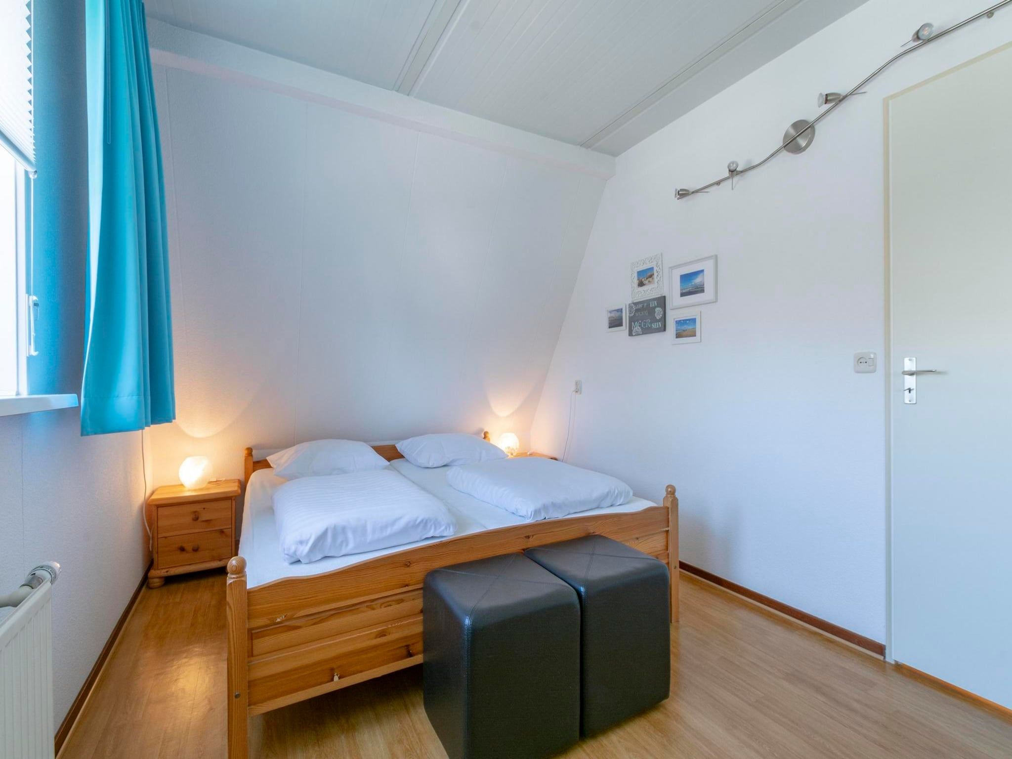 Een slaapkamer van Campanula 52 in Sint Maartenszee