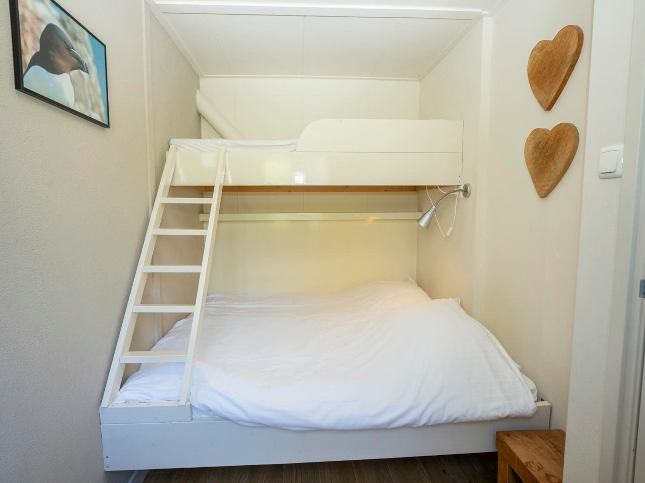 Een slaapkamer van Strandhuys Schelp in De Koog