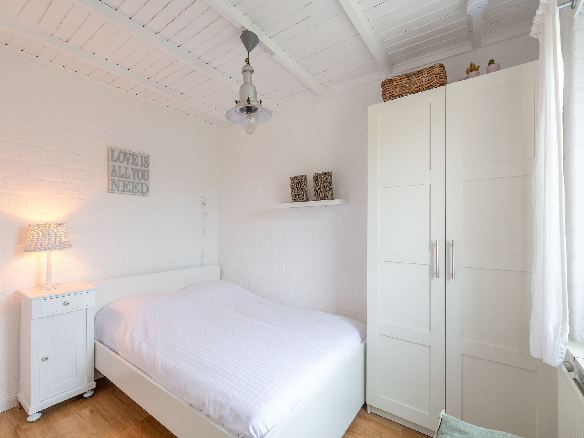 Een slaapkamer van De Blenck 3 in Callantsoog