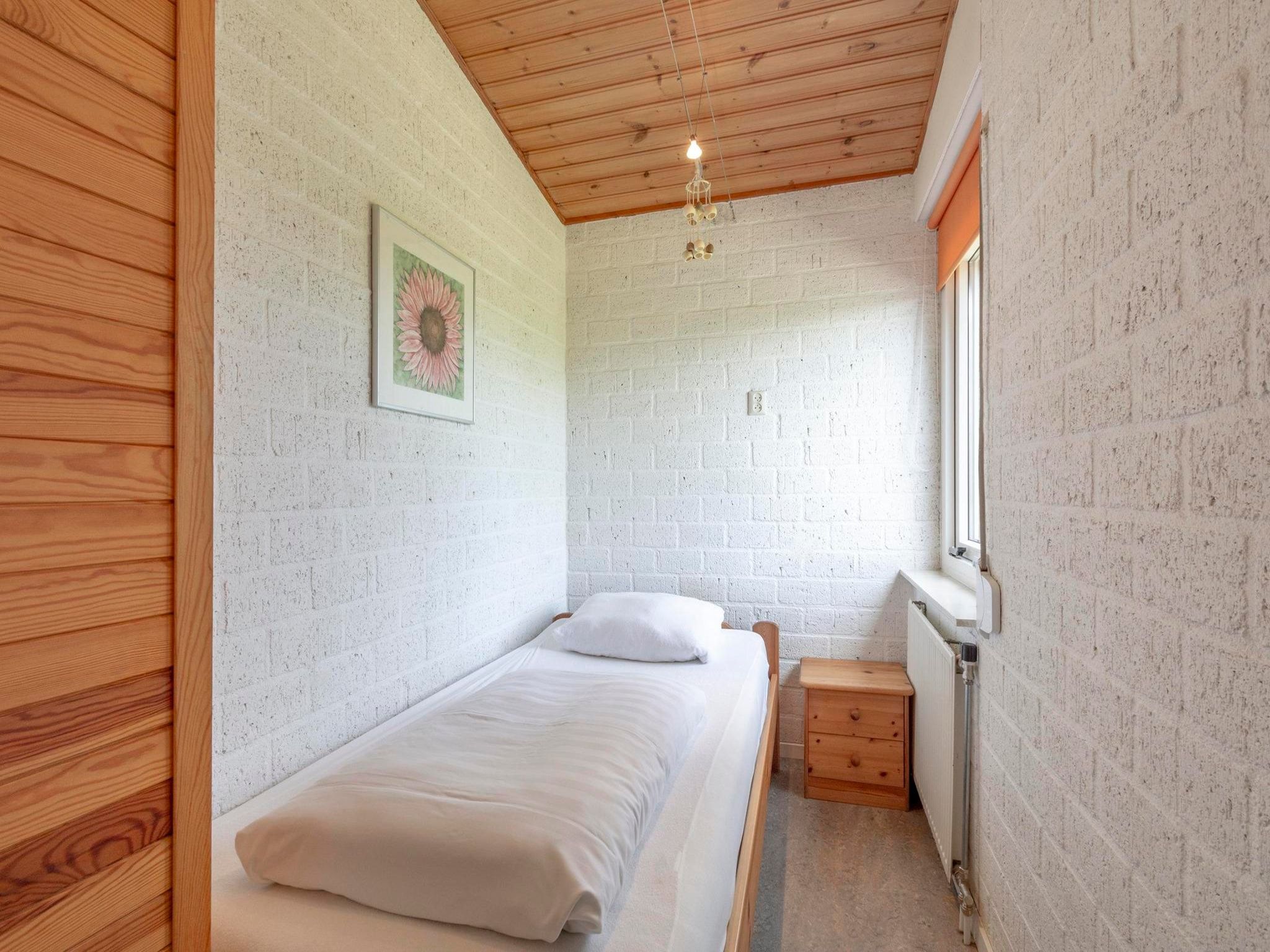 Een slaapkamer van De Blenck 49 in Callantsoog