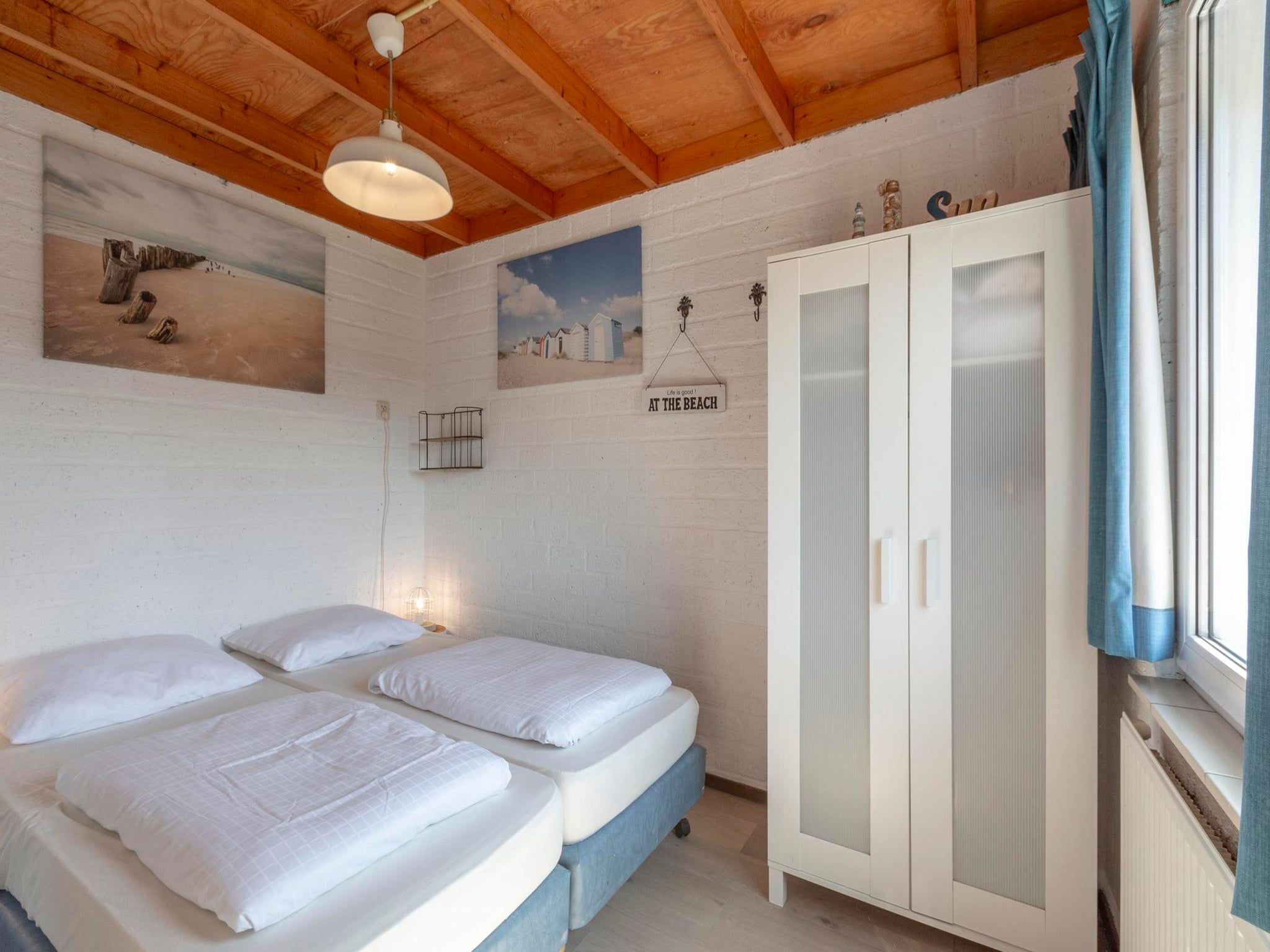 Een slaapkamer van De Blenck 67 in Callantsoog