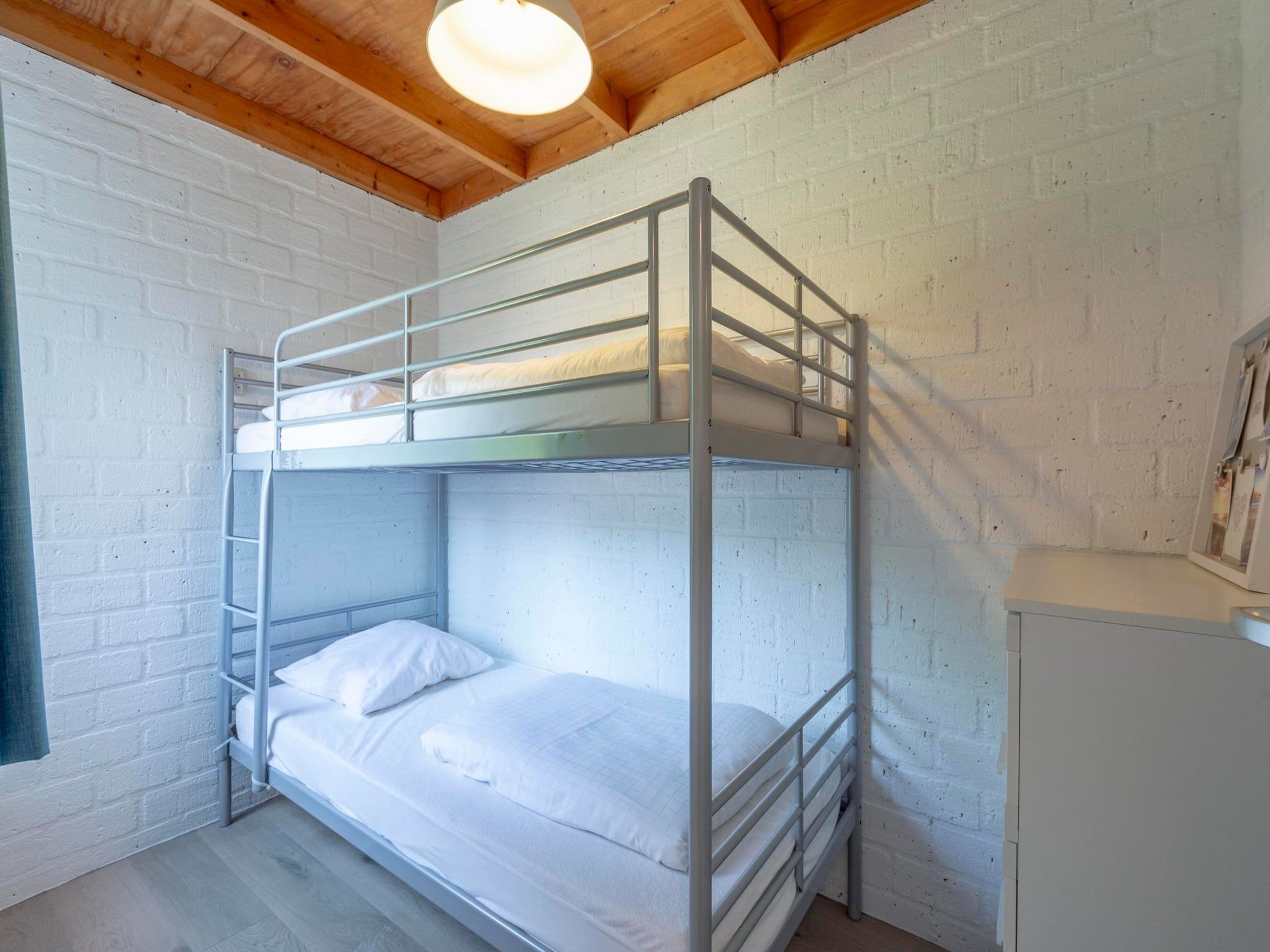 Een slaapkamer van De Blenck 67 in Callantsoog