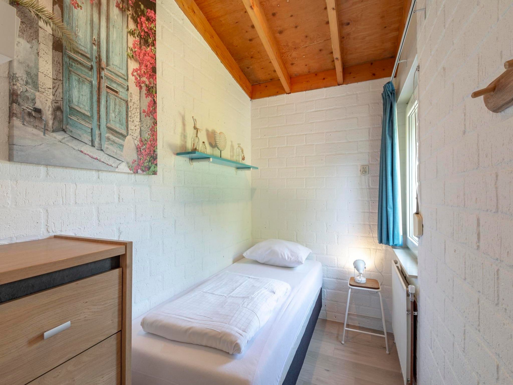 Een slaapkamer van De Blenck 67 in Callantsoog
