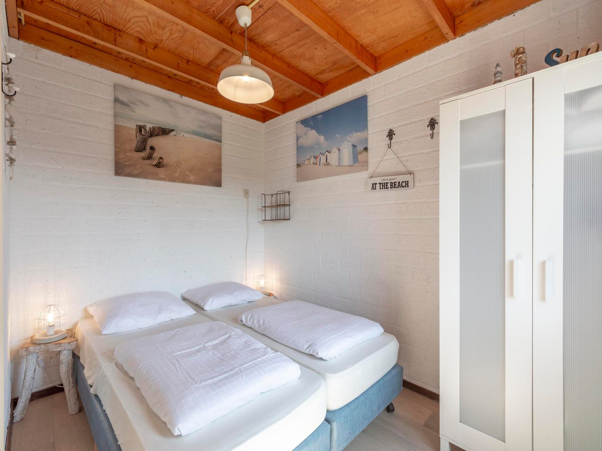 Een slaapkamer van De Blenck 67 in Callantsoog