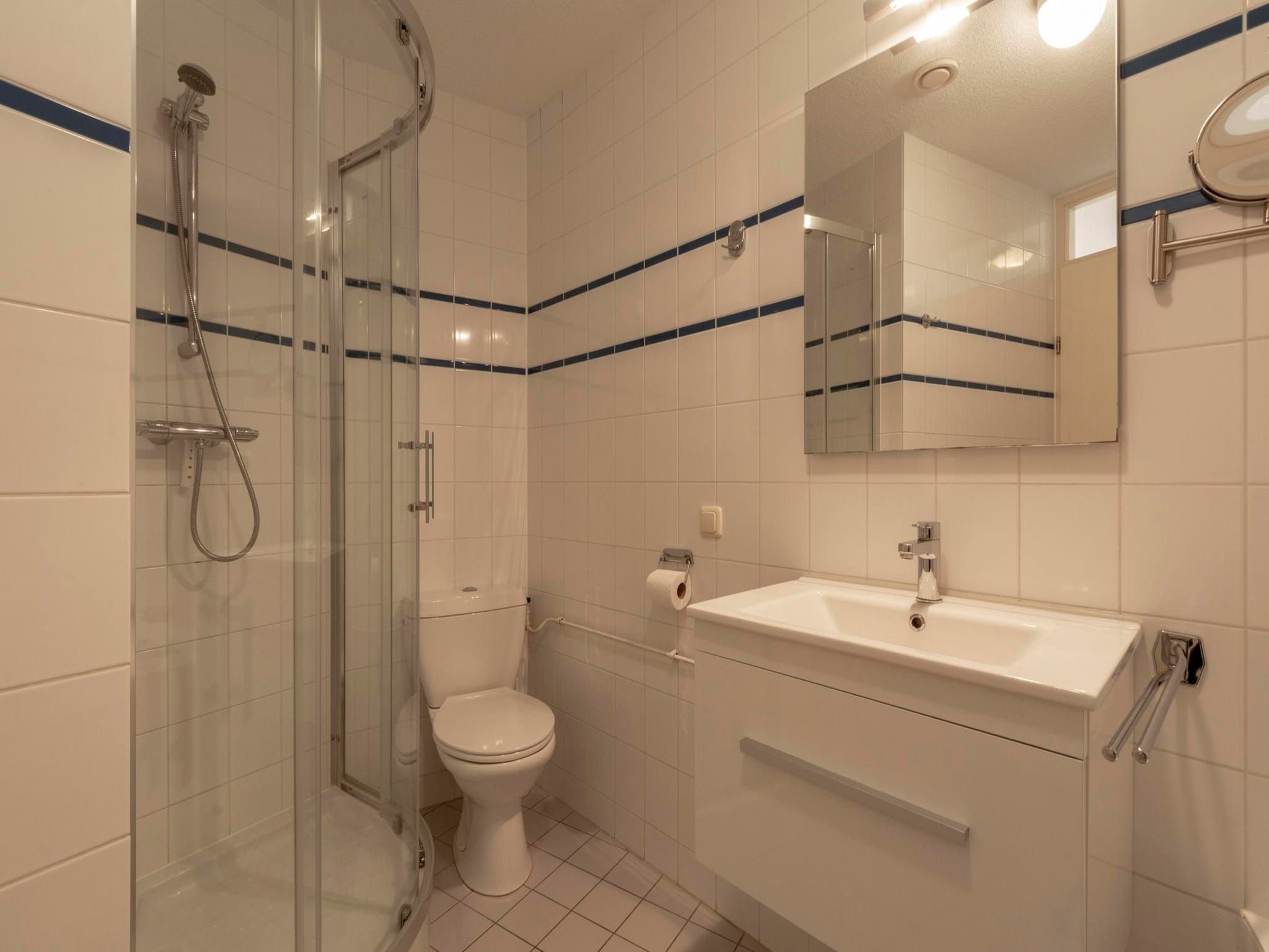 De badkamer van Résidence Juliana 77 in Julianadorp aan Zee