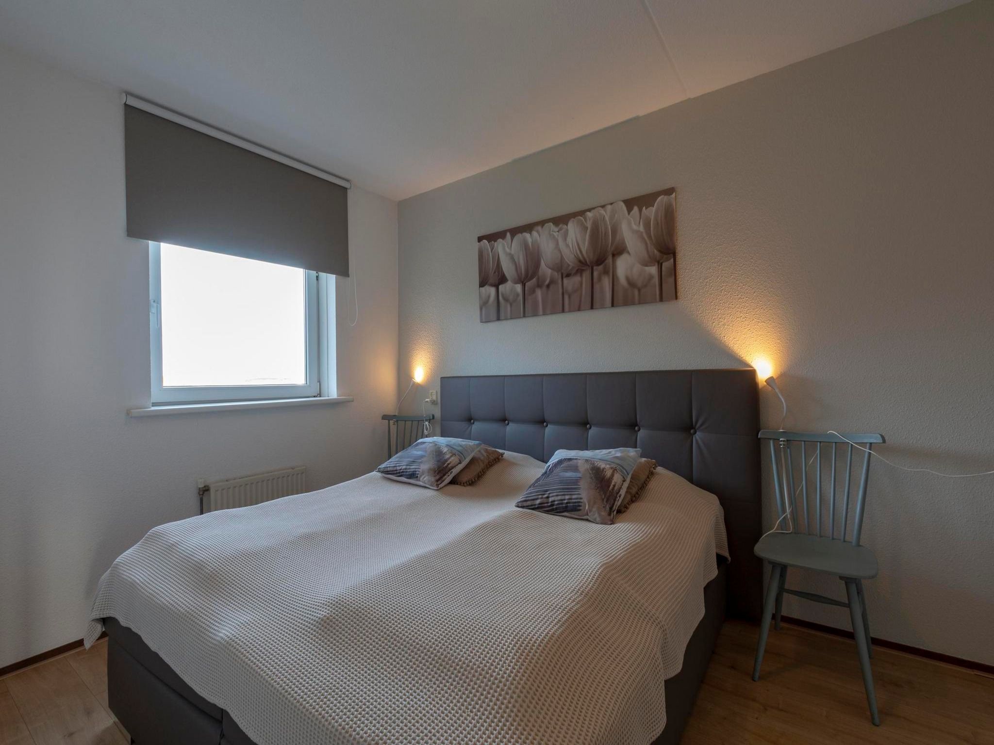 Een slaapkamer van Résidence Juliana 77 in Julianadorp aan Zee