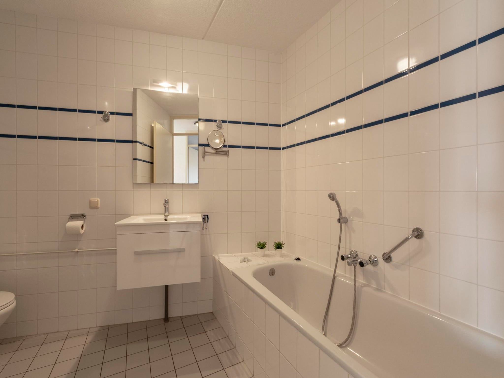De badkamer van Résidence Juliana 77 in Julianadorp aan Zee