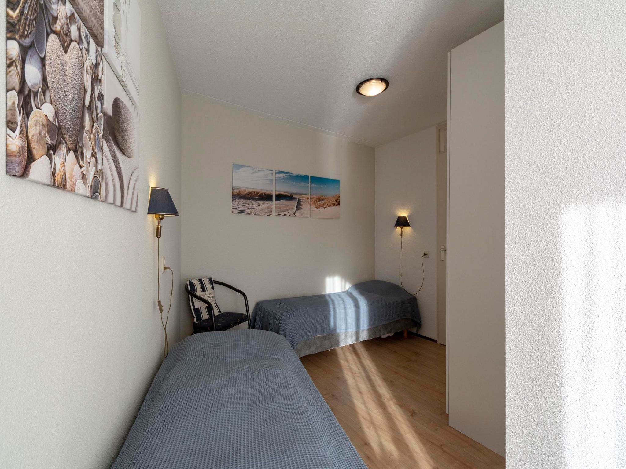 Een slaapkamer van Résidence Juliana 77 in Julianadorp aan Zee