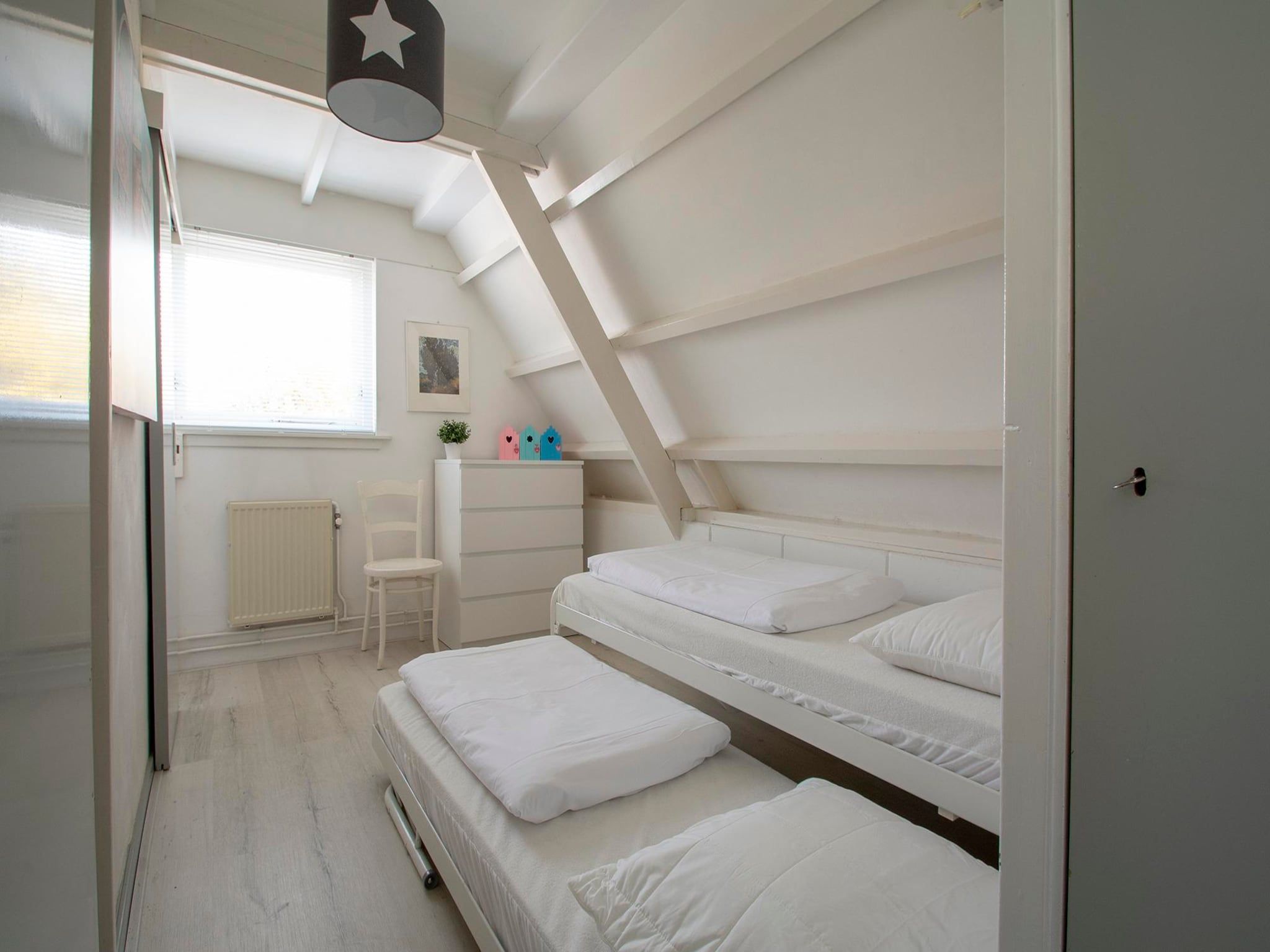 Een slaapkamer van Sandepark 165 in Groote Keeten